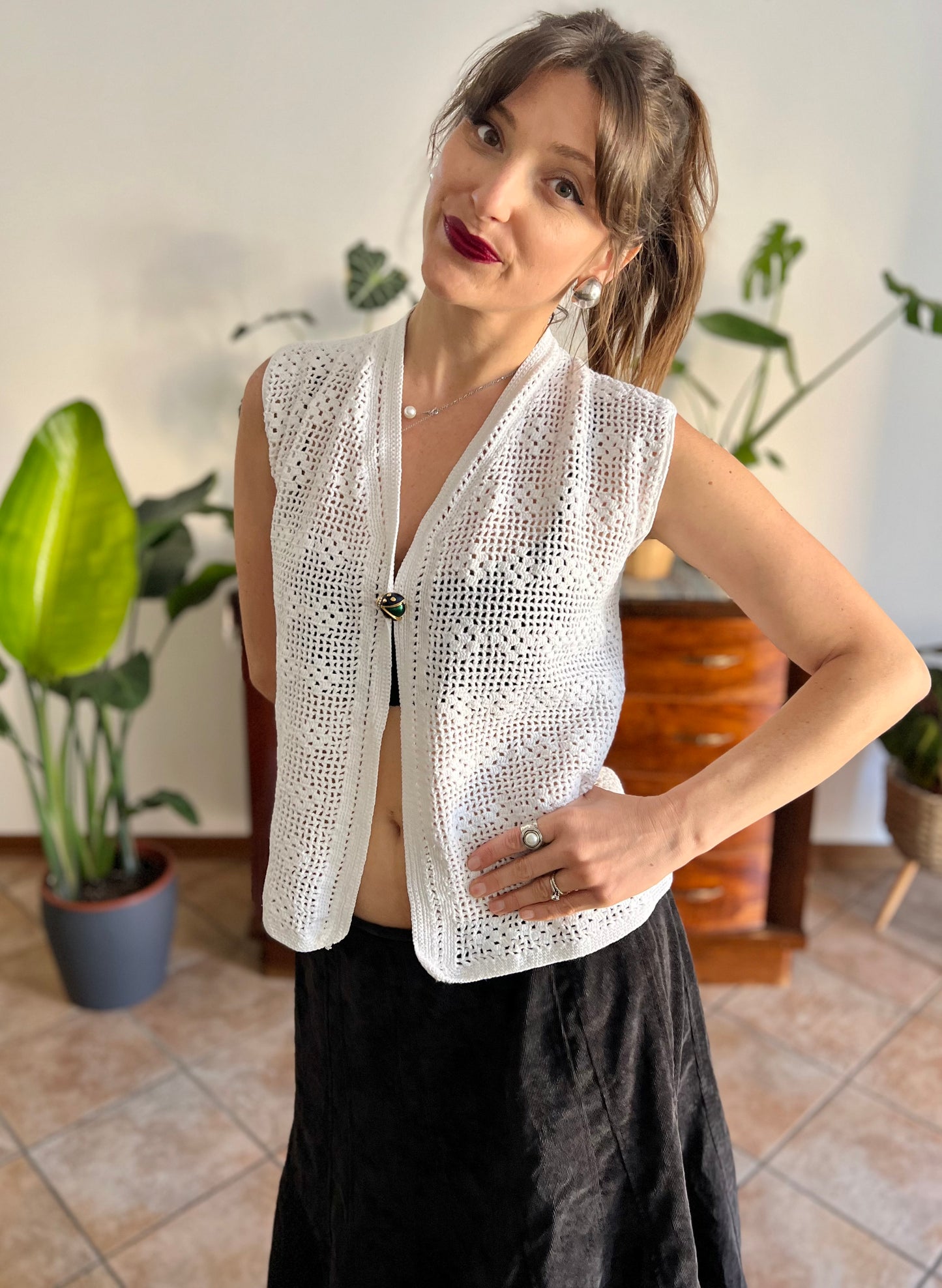 1970's vintage hand crocheted white vest with blue and green lady bug pin closure