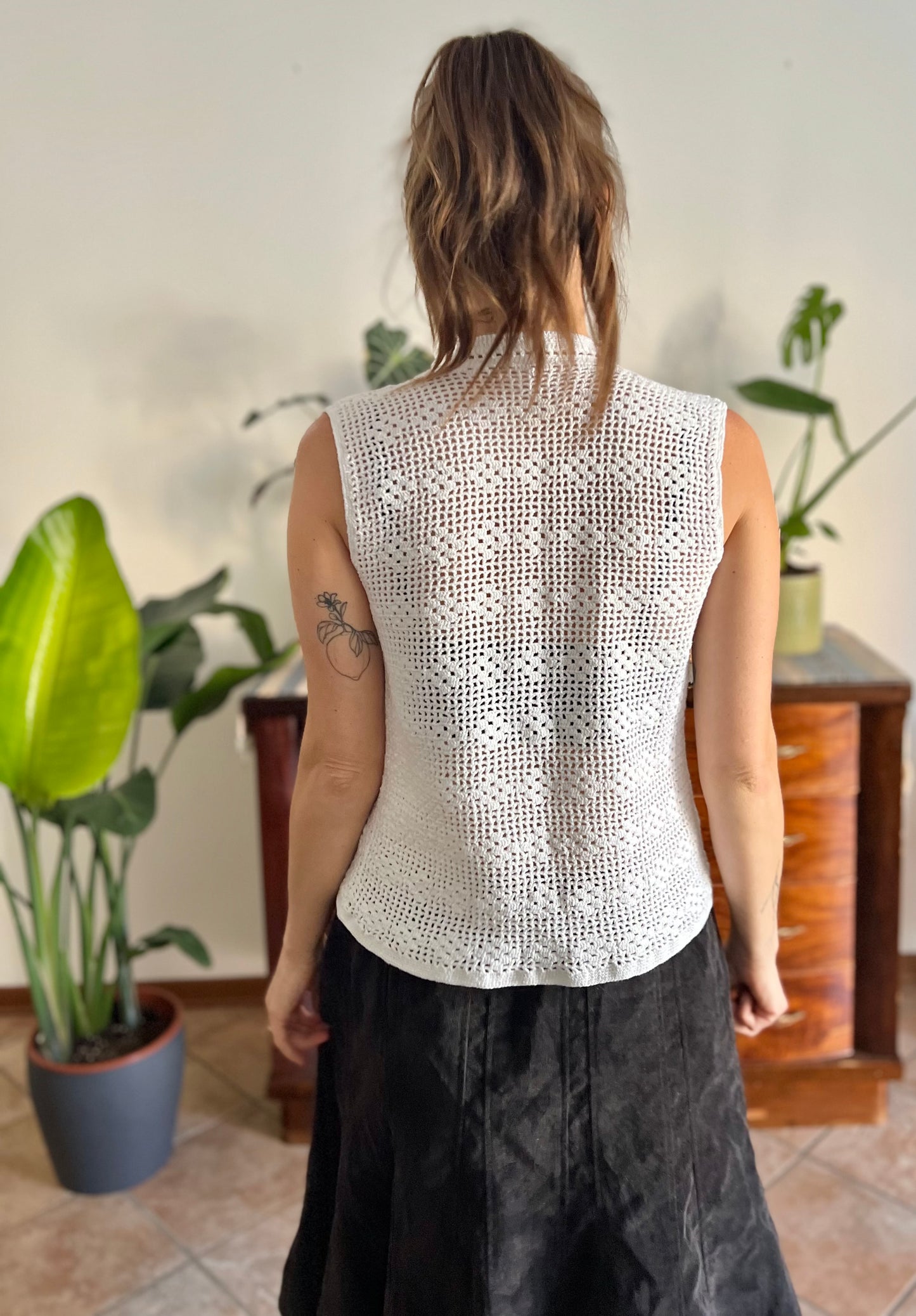 1970's vintage hand crocheted white vest with blue and green lady bug pin closure