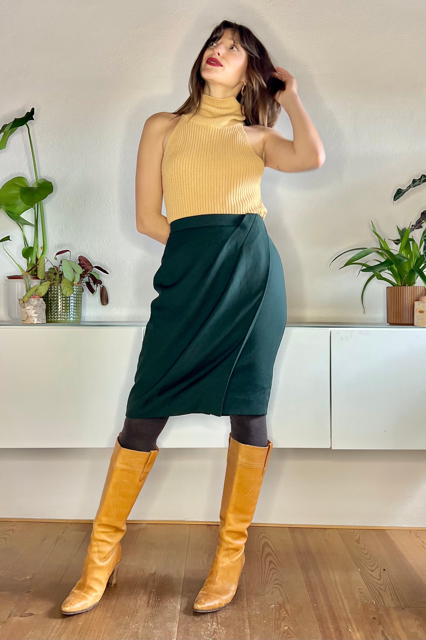 1970's vintage dark green wool midi skirt with asymmetrical pleat detail