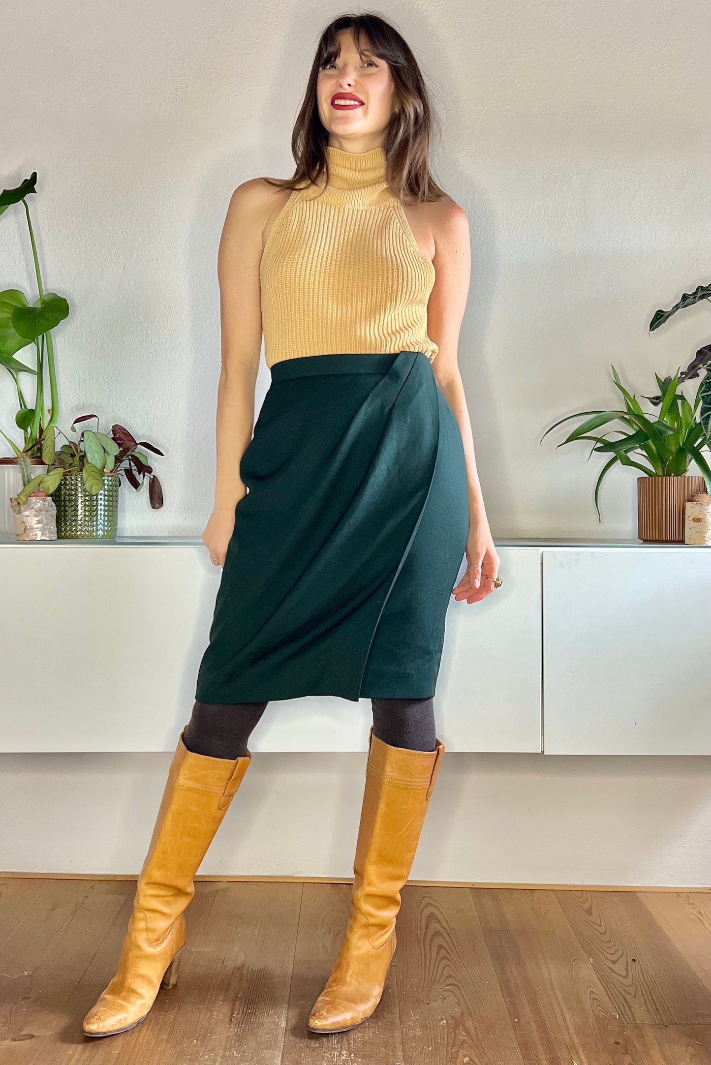 1970's vintage dark green wool midi skirt with asymmetrical pleat detail