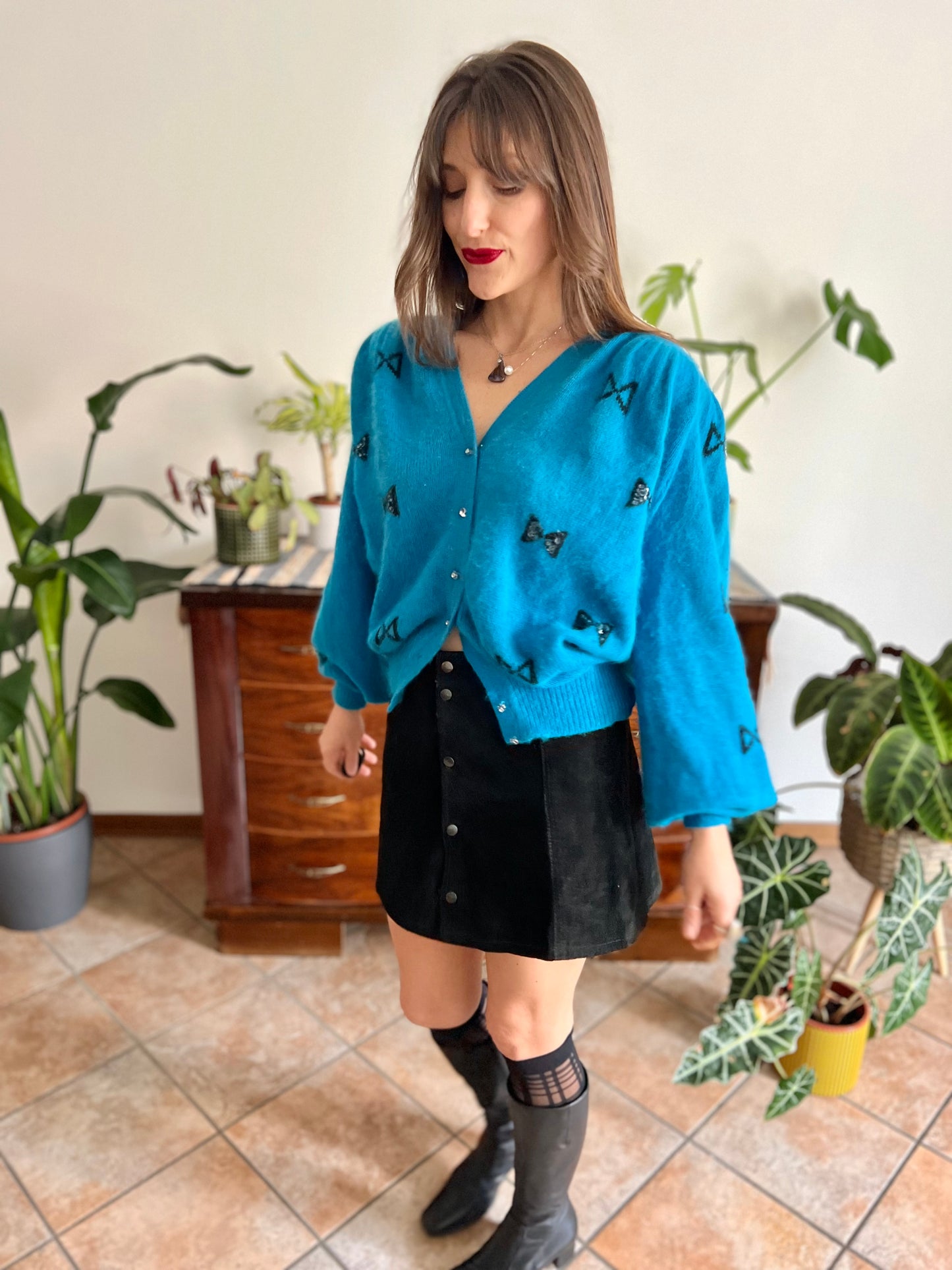 1960's vintage turquoise angora cardigan with black bow details