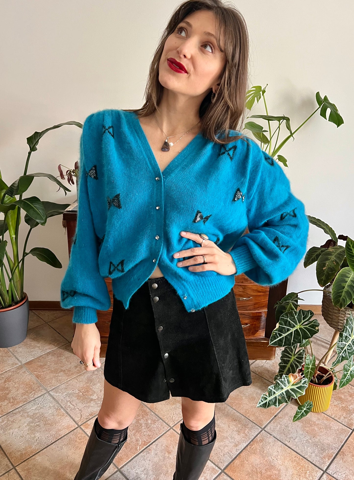1960's vintage turquoise angora cardigan with black bow details