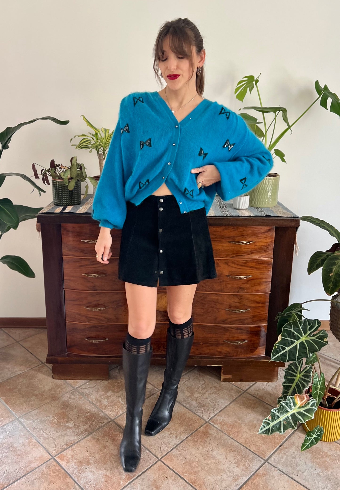 1960's vintage turquoise angora cardigan with black bow details