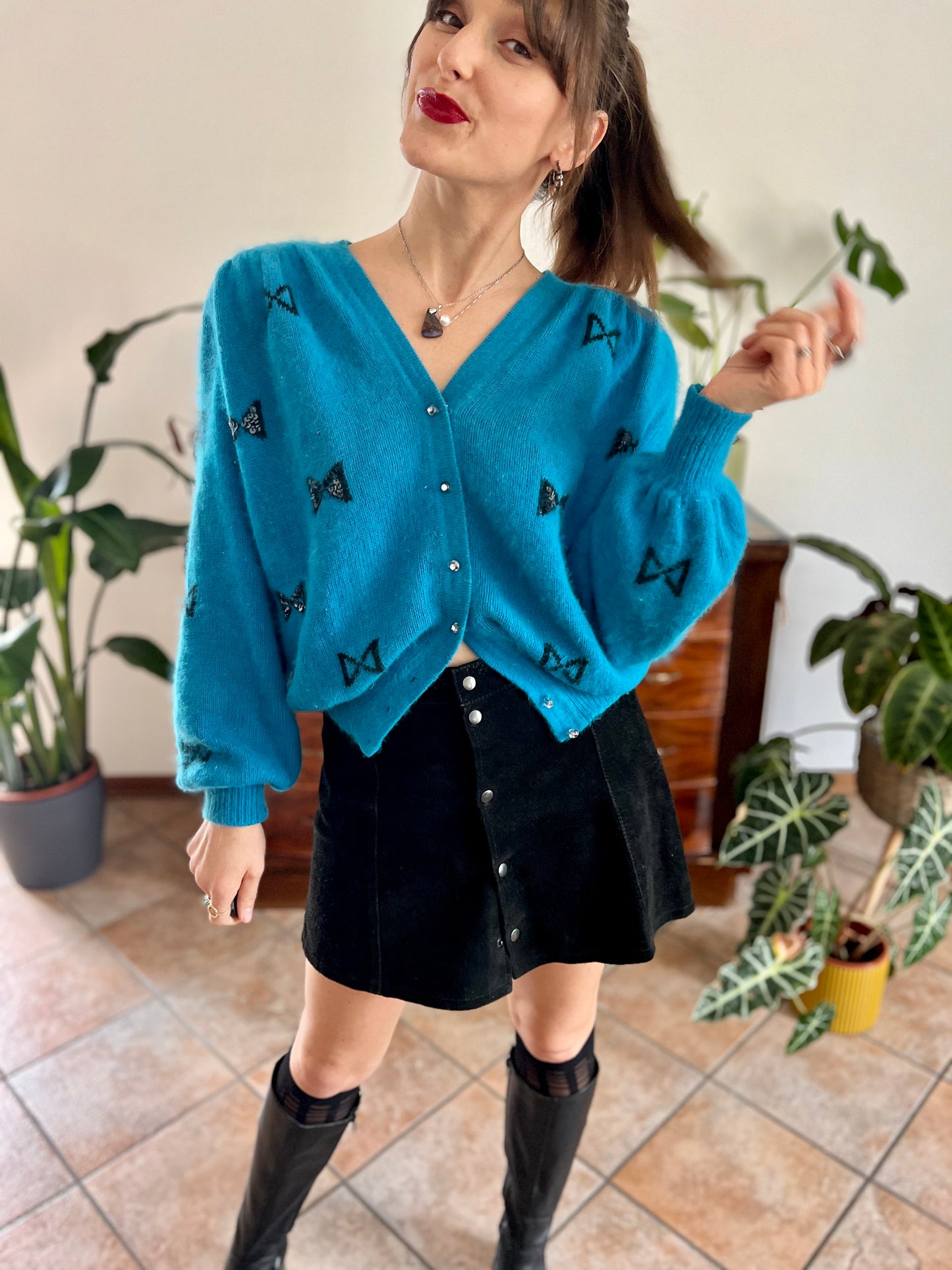 1960's vintage turquoise angora cardigan with black bow details