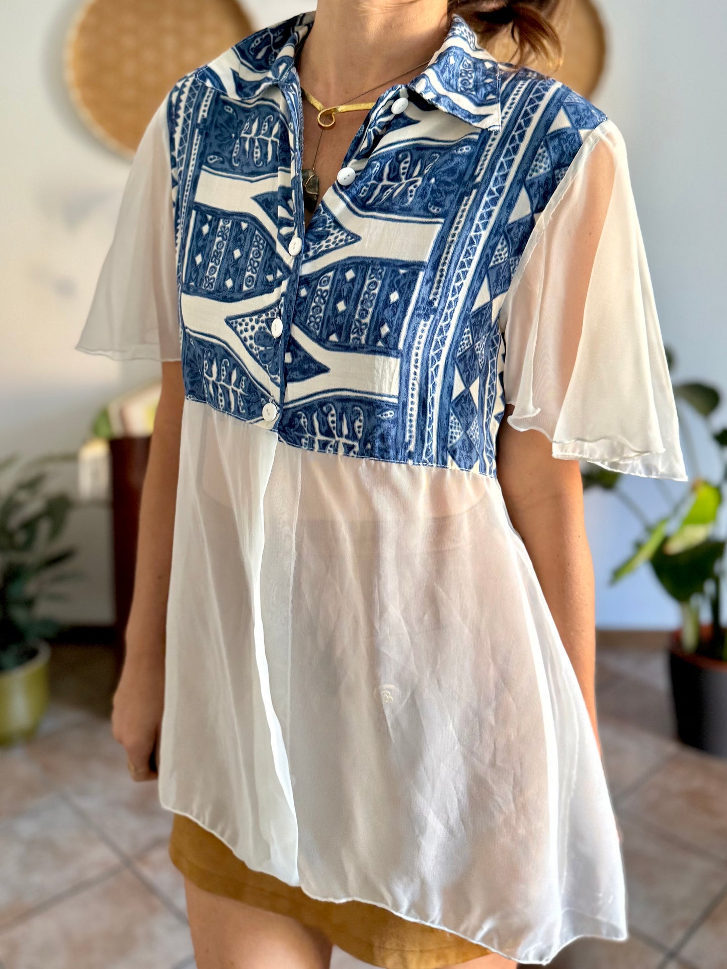 1990's vintage blue and cream geometric print blouse with sheer cream paneling and sleeves