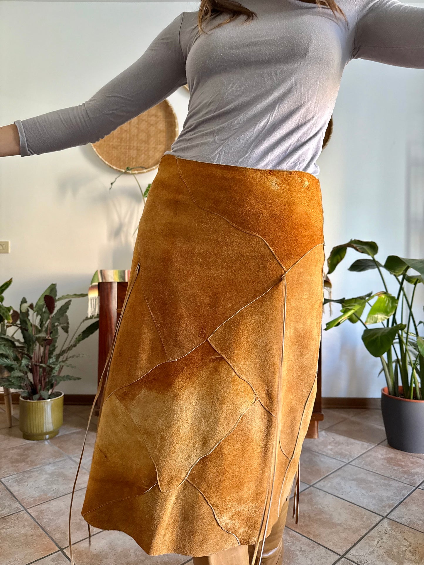 1970's vintage tan leather western style midi skirt with fringe detail
