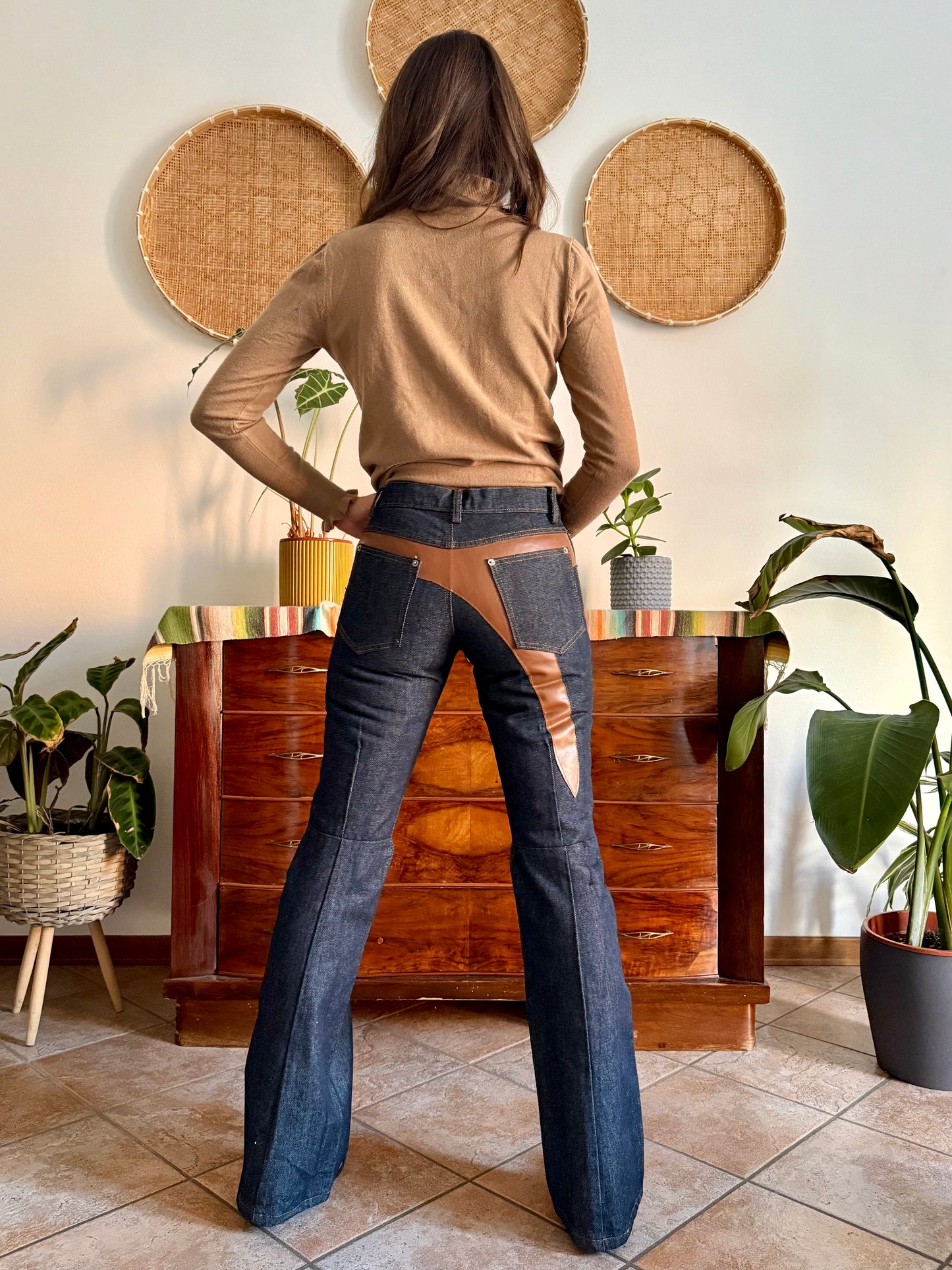 1990's vintage dark blue belle bottom jeans with tan faux leather panels