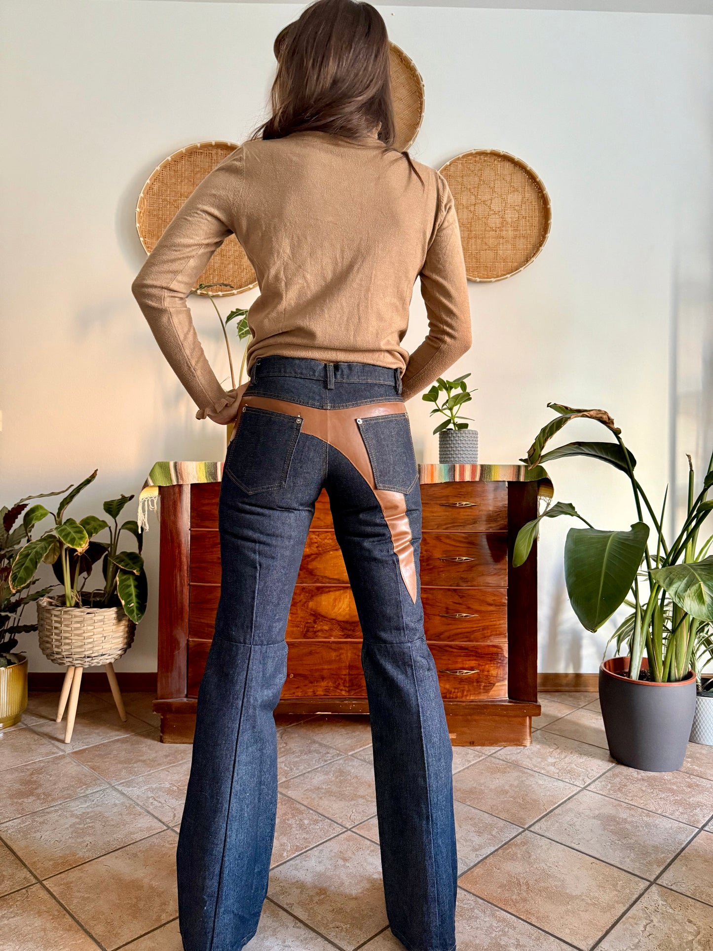 1990's vintage dark blue belle bottom jeans with tan faux leather panels