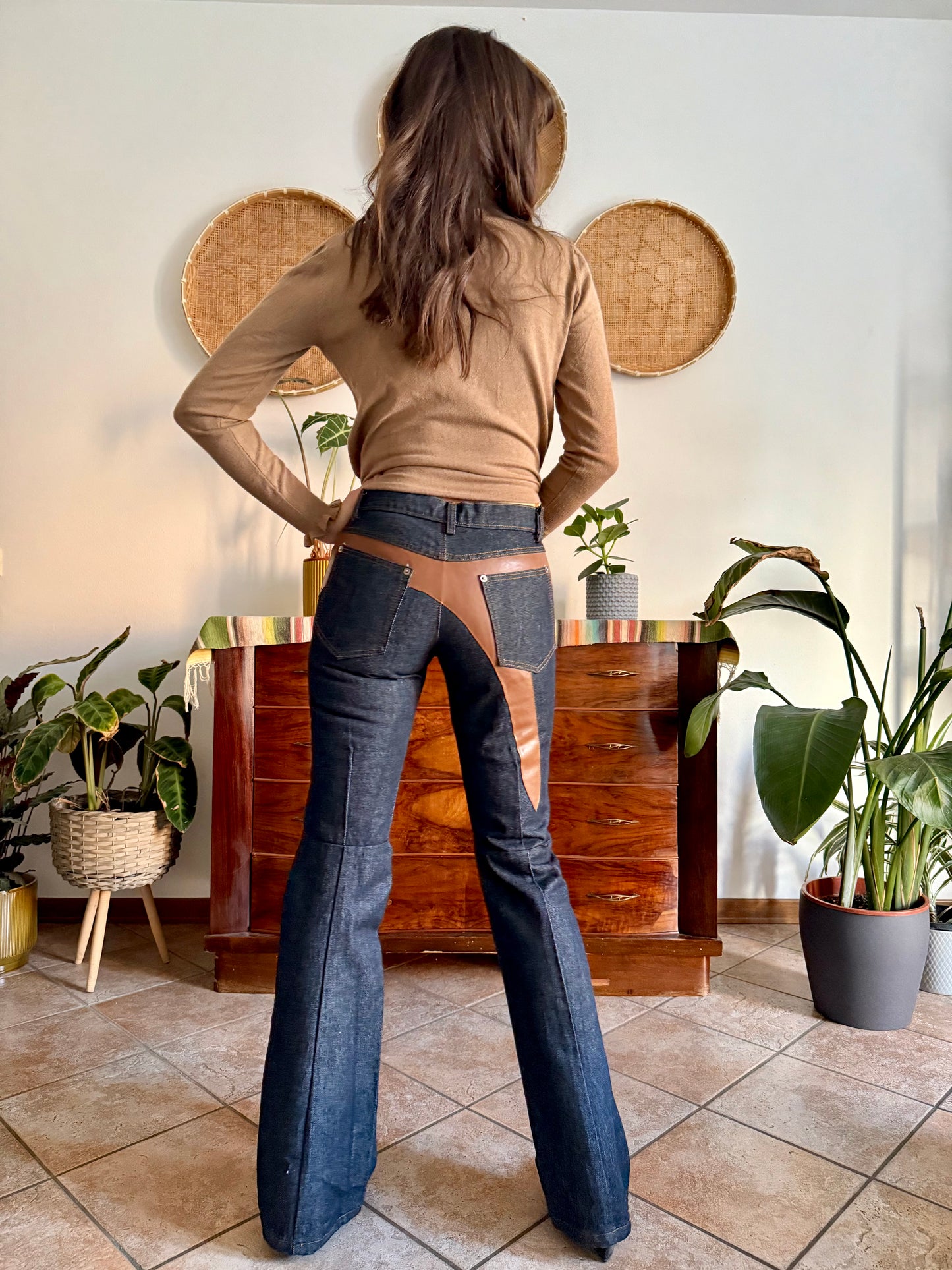 1990's vintage dark blue belle bottom jeans with tan faux leather panels