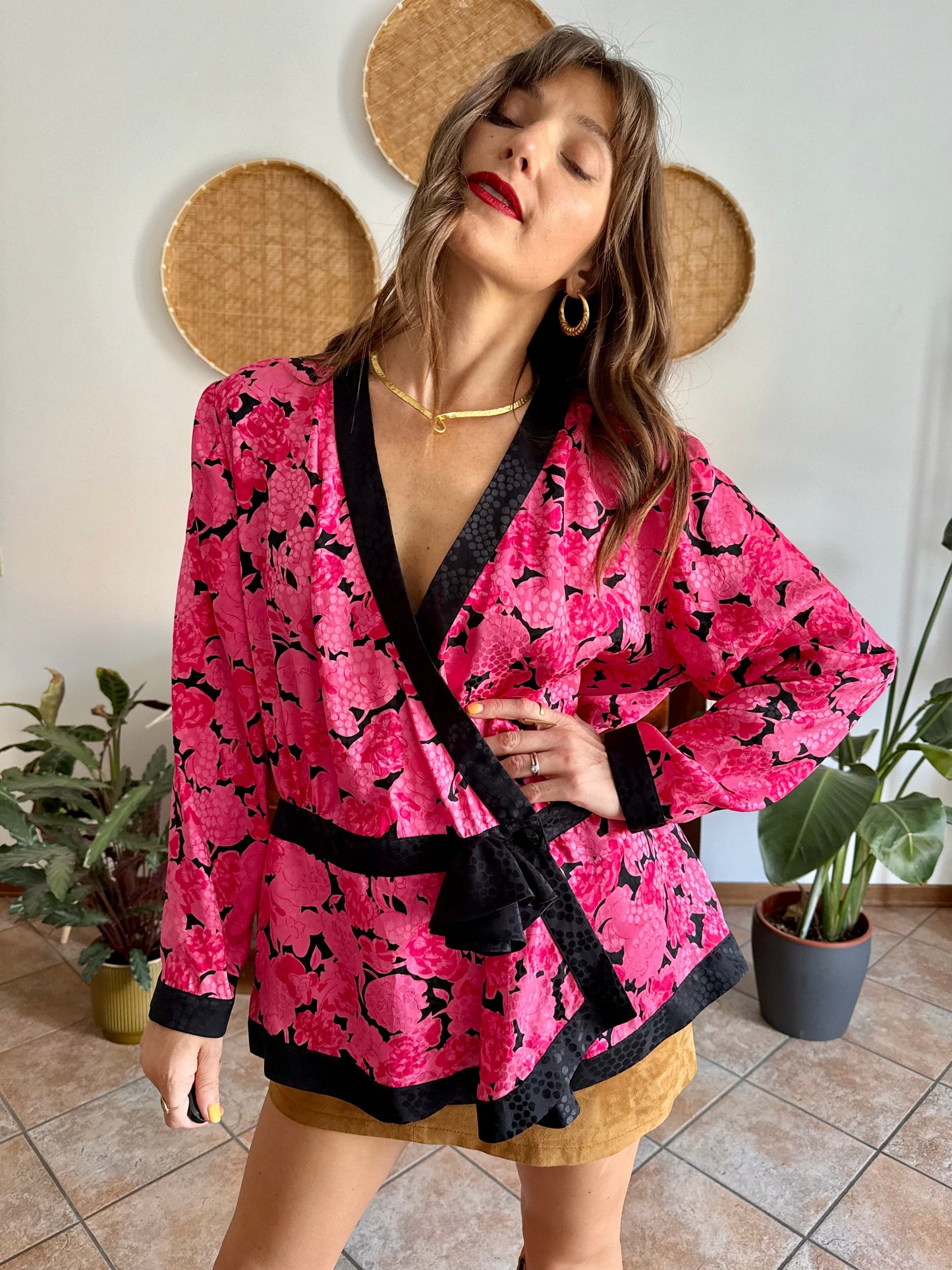 1980's vintage silk fuchsia and black floral peplum blouse with rosette details