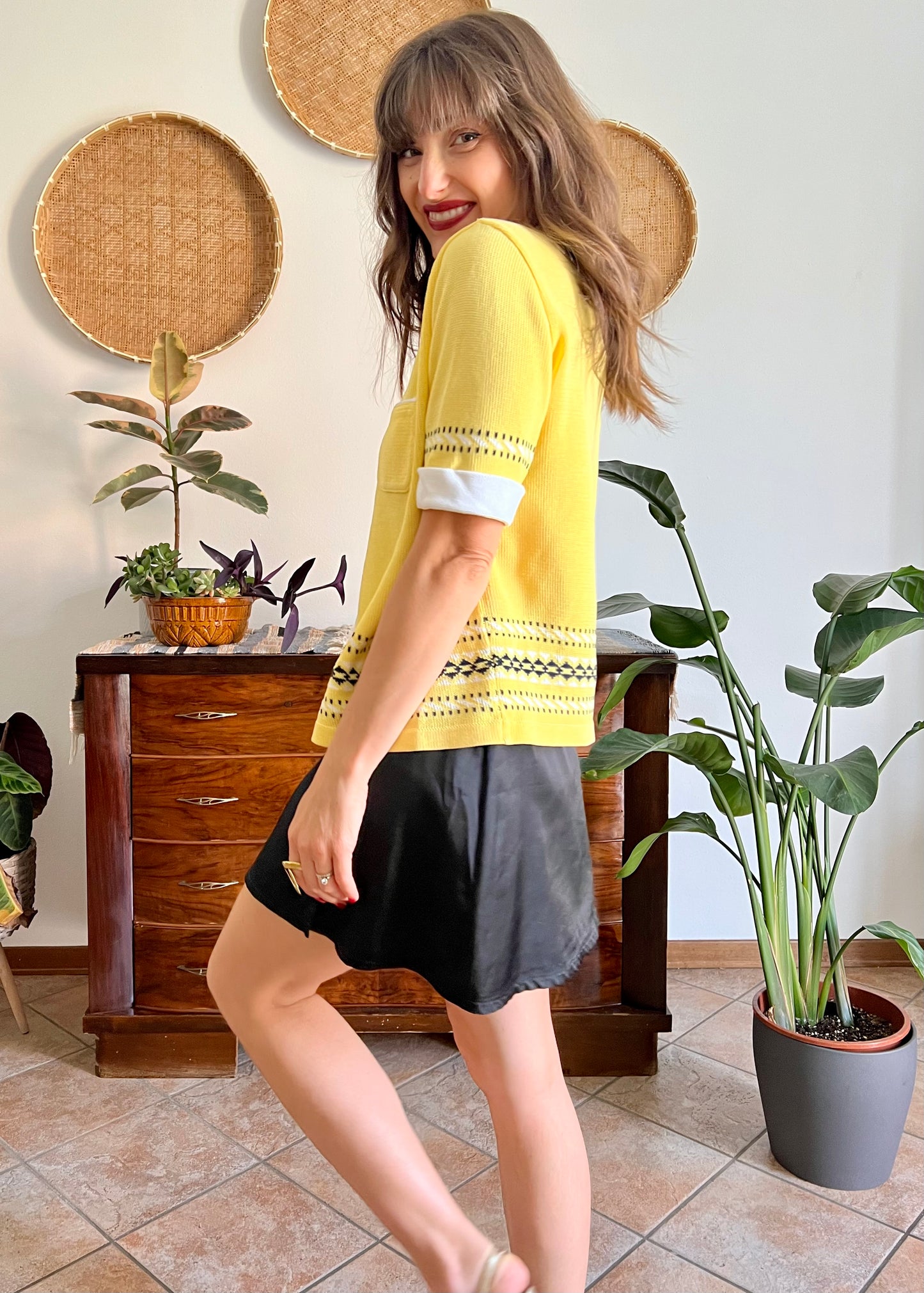 1980's vintage yellow short sleeve knit cardigan with black and white knit pattern