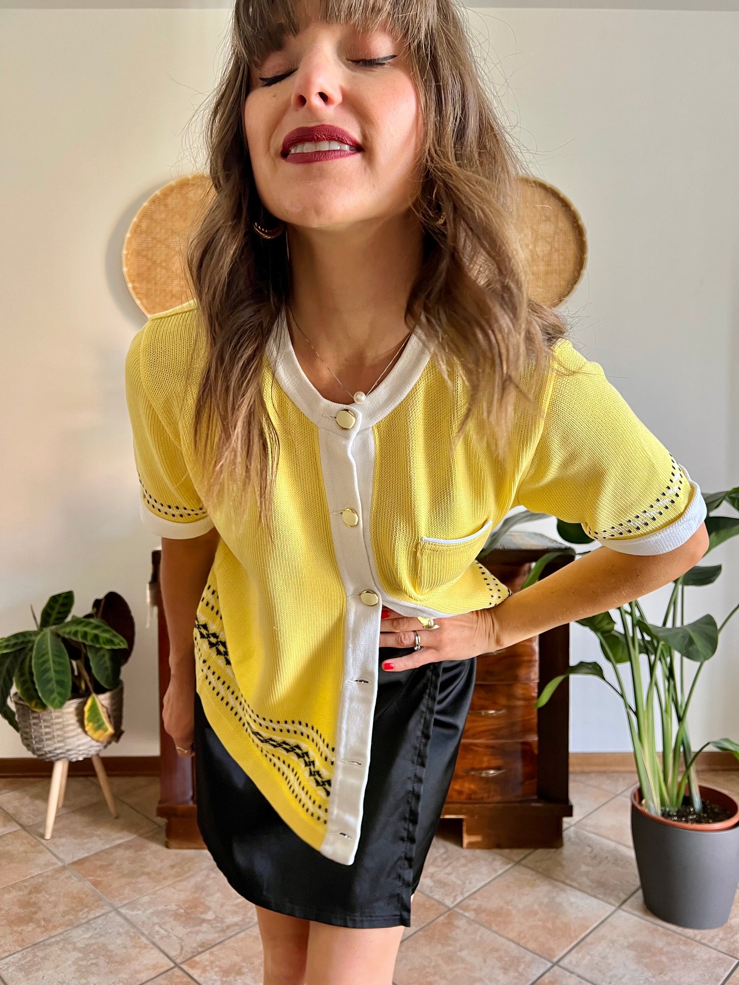 1980's vintage yellow short sleeve knit cardigan with black and white knit pattern