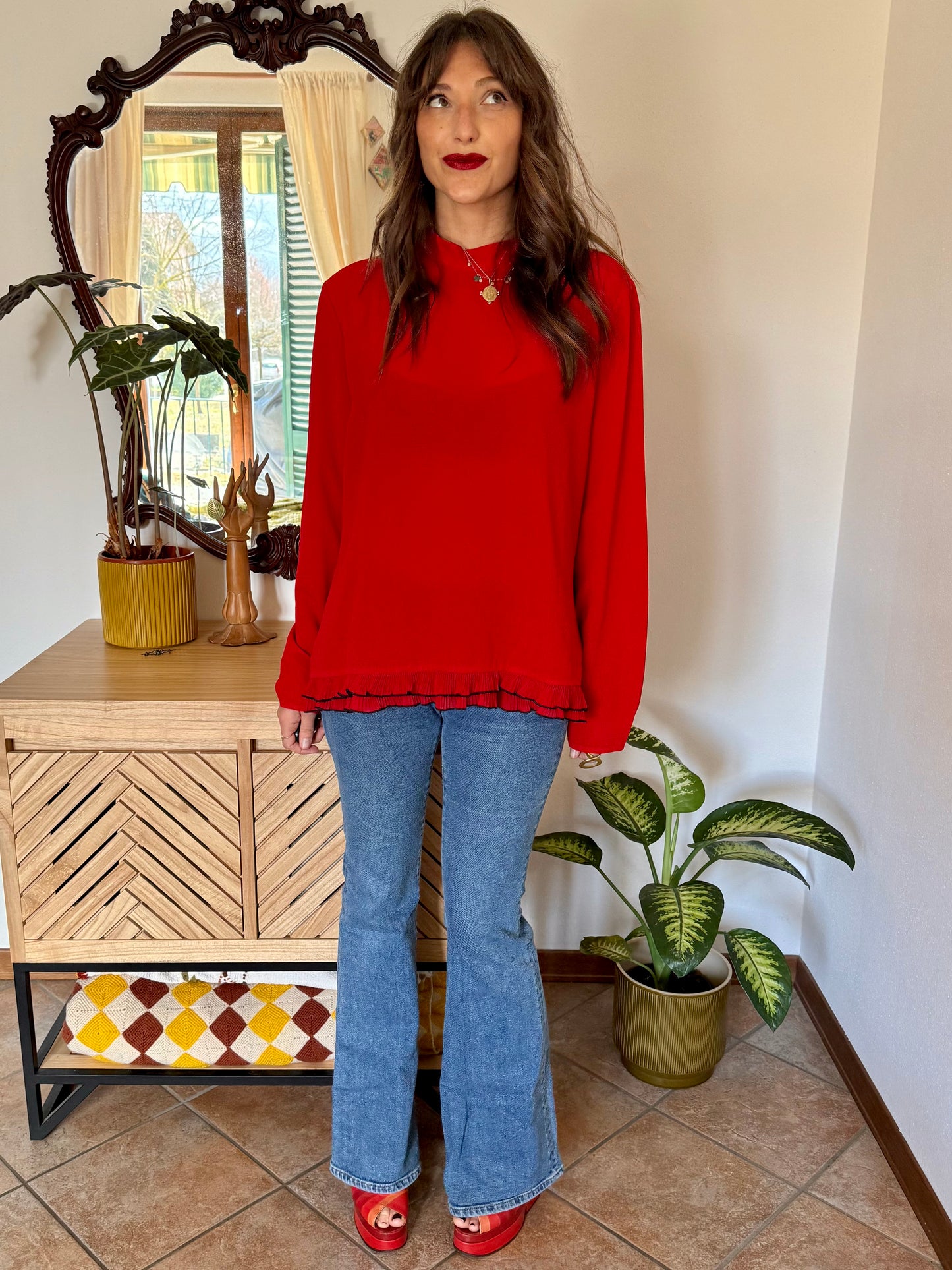 1980's vintage cherry red textured blouse with black ruffle hem