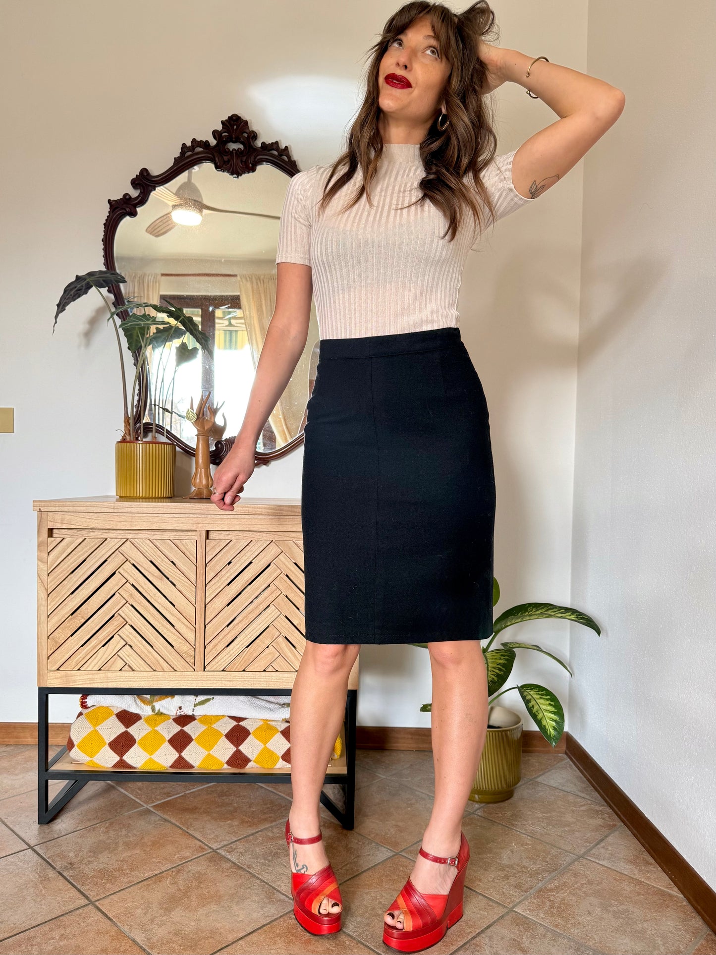 1970's vintage black wool midi skirt with button details