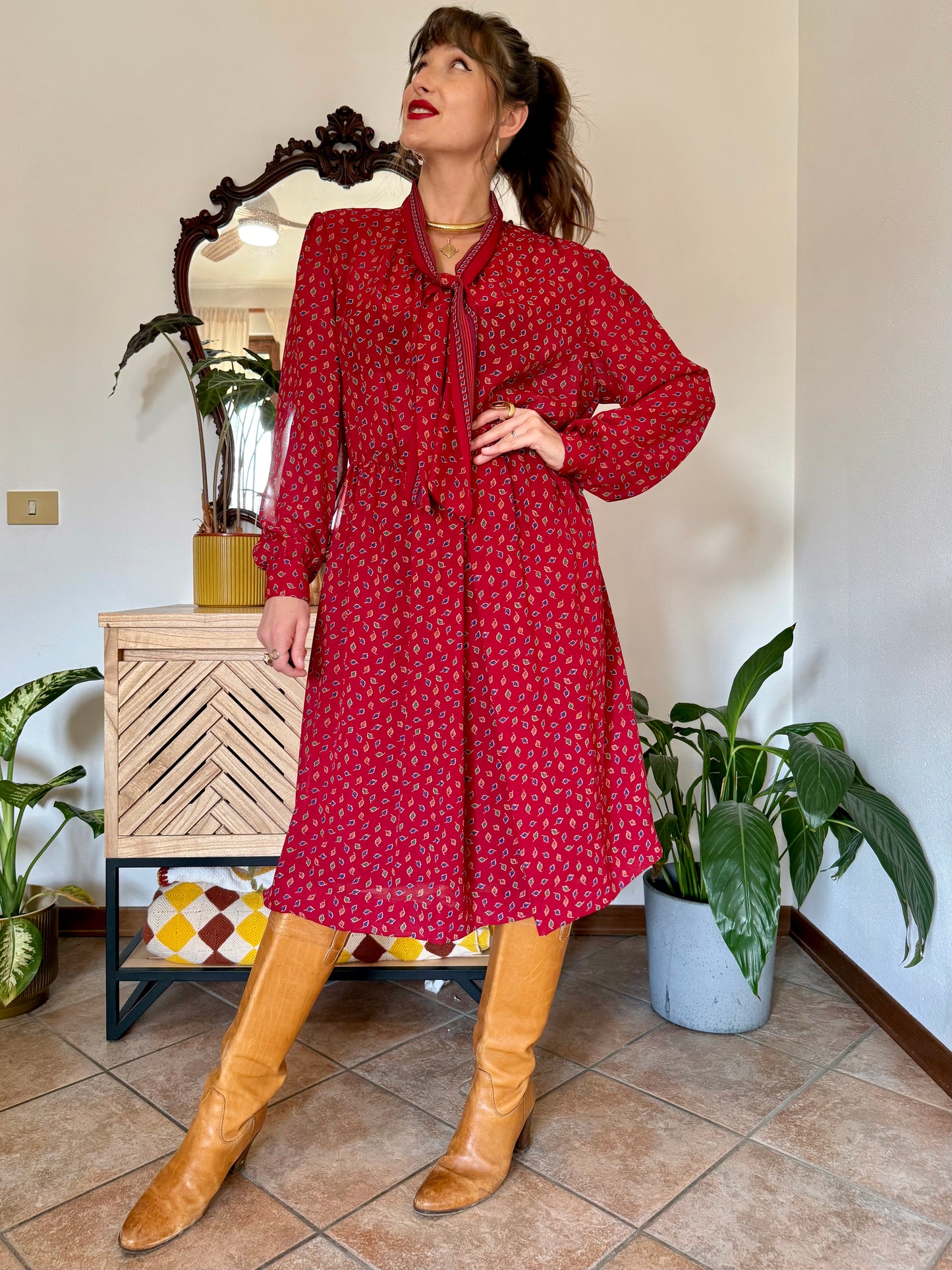1970's vintage dark red bow tie dress with blue, green and orange leaf print midi dress
