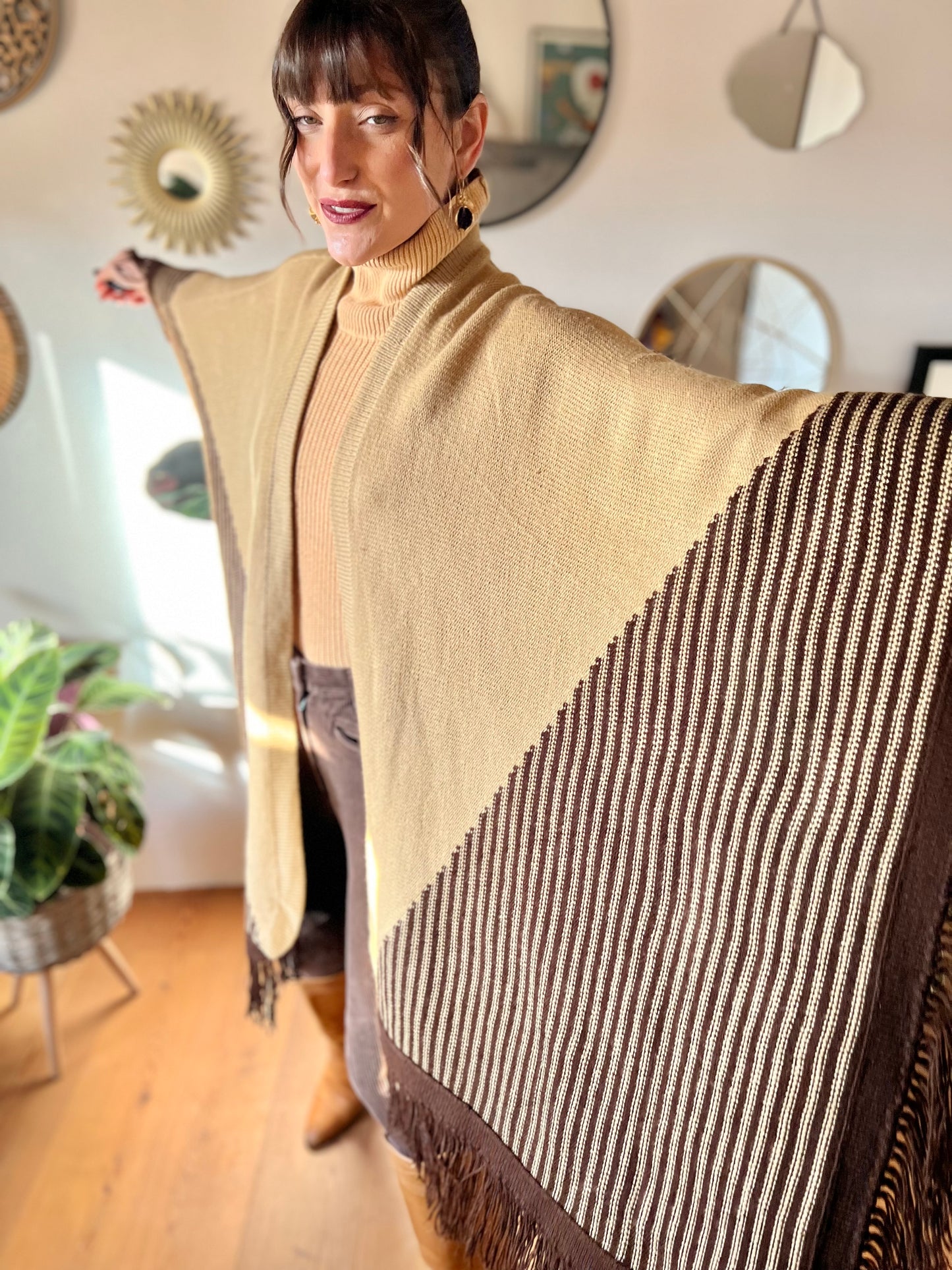 1970's vintage hand knit tan and chocolate brown geometric knit poncho with fringe detail