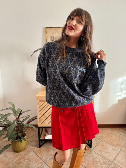 1970's grey wool pullover with blue geometric knit pattern and pocket detail