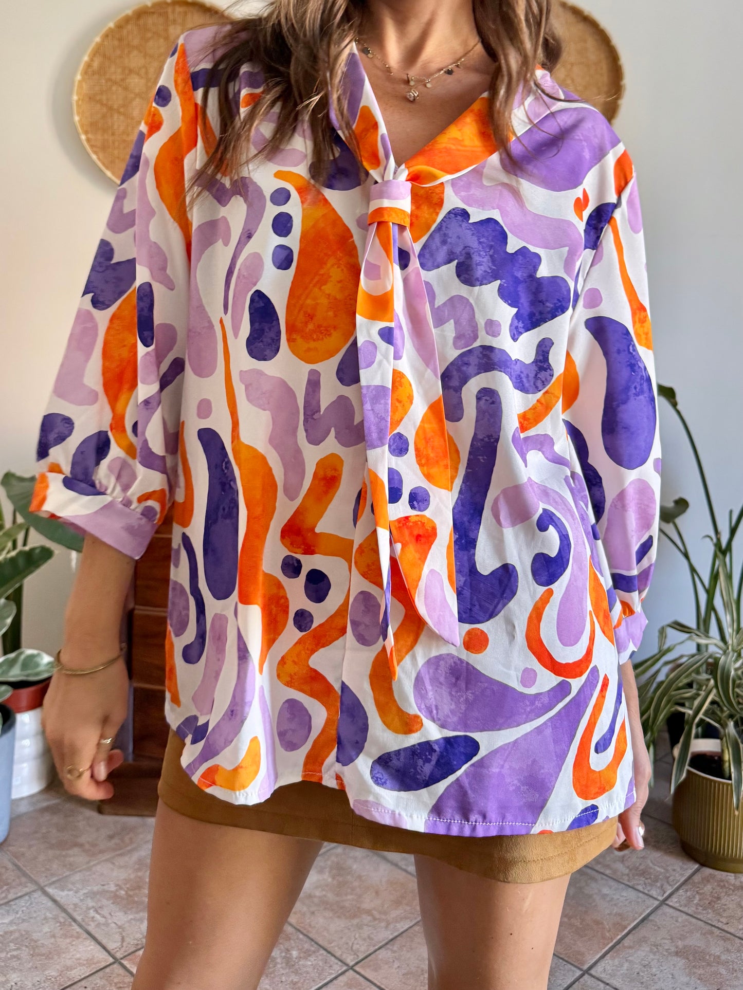 1970's vintage purple, orange and cream abstract print tie neck blouse