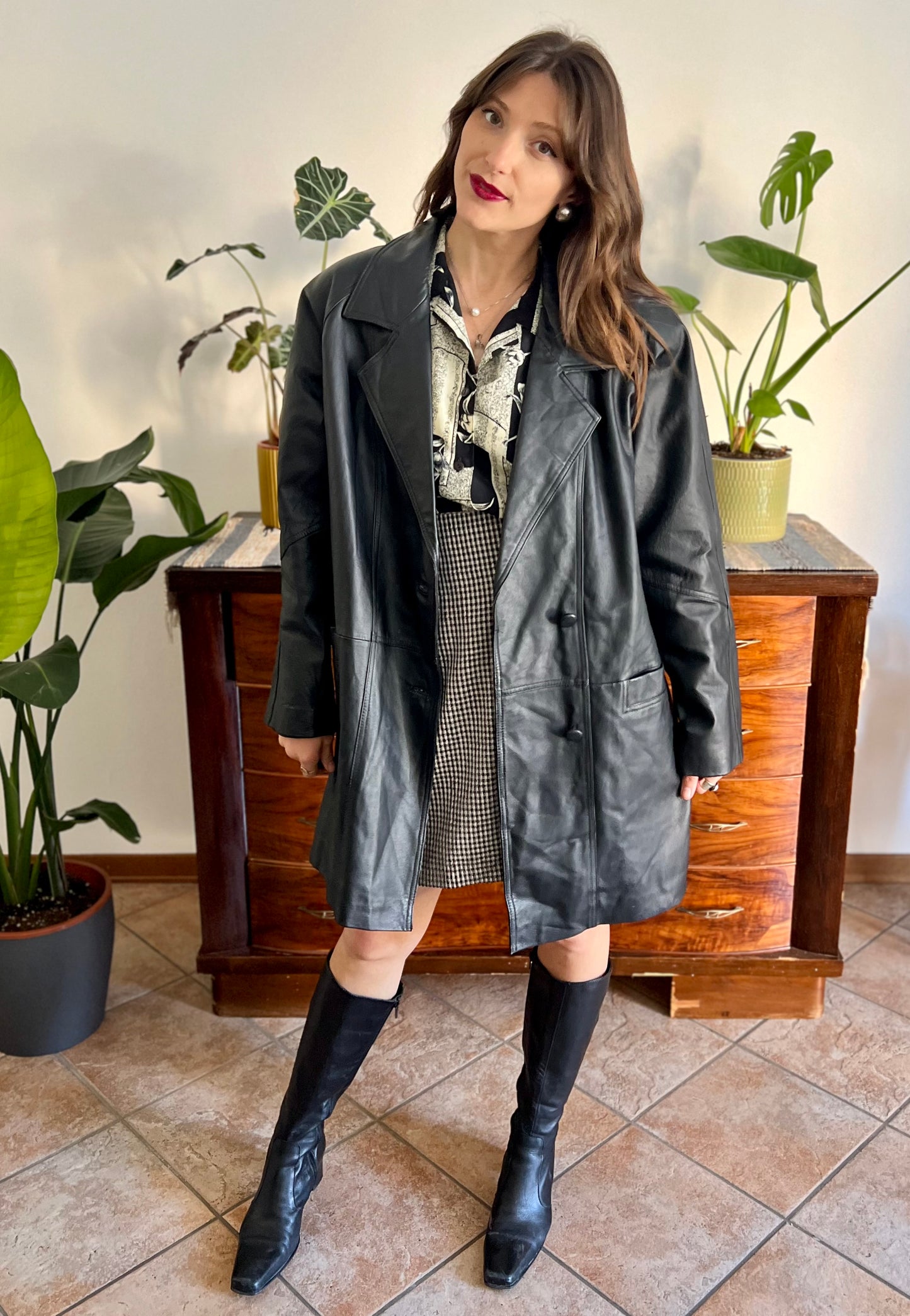 1980's vintage oversize black leather jacket with asymmetrical buttons