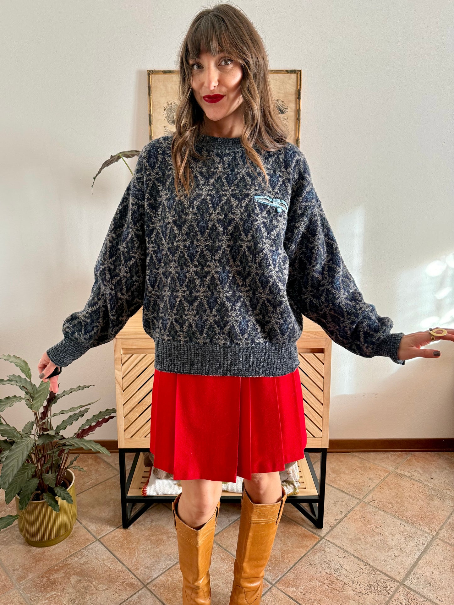 1970's grey wool pullover with blue geometric knit pattern and pocket detail