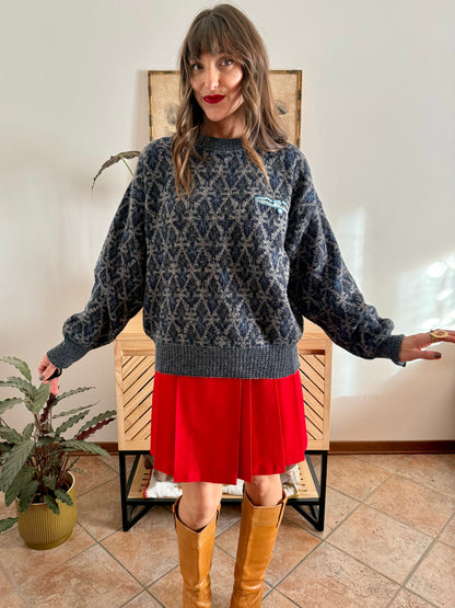 1970's grey wool pullover with blue geometric knit pattern and pocket detail