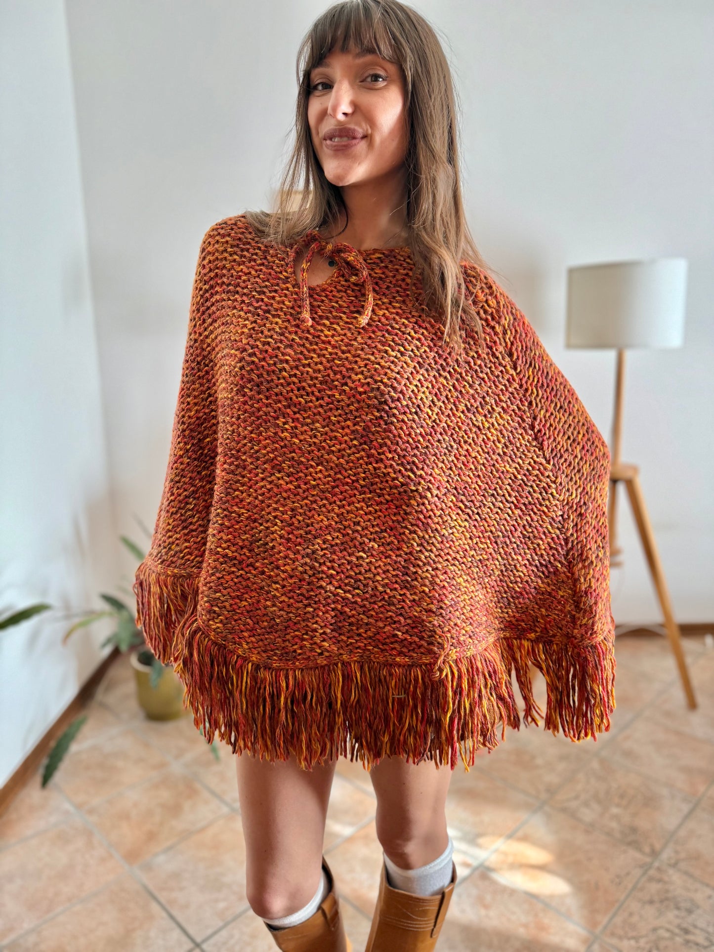 1970's vintage yellow and burgundy knit poncho with fringe details