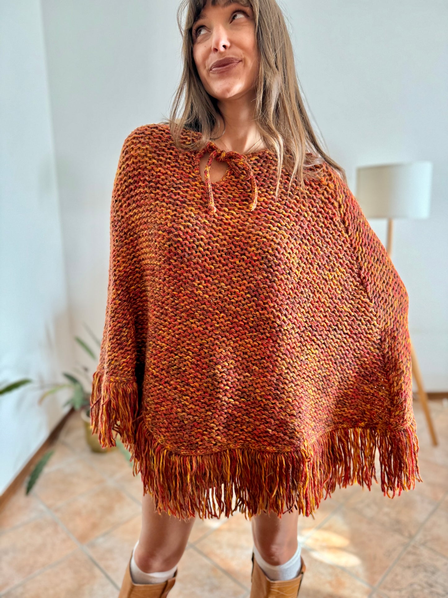1970's vintage yellow and burgundy knit poncho with fringe details