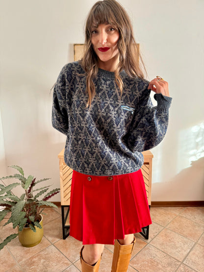 1970's grey wool pullover with blue geometric knit pattern and pocket detail