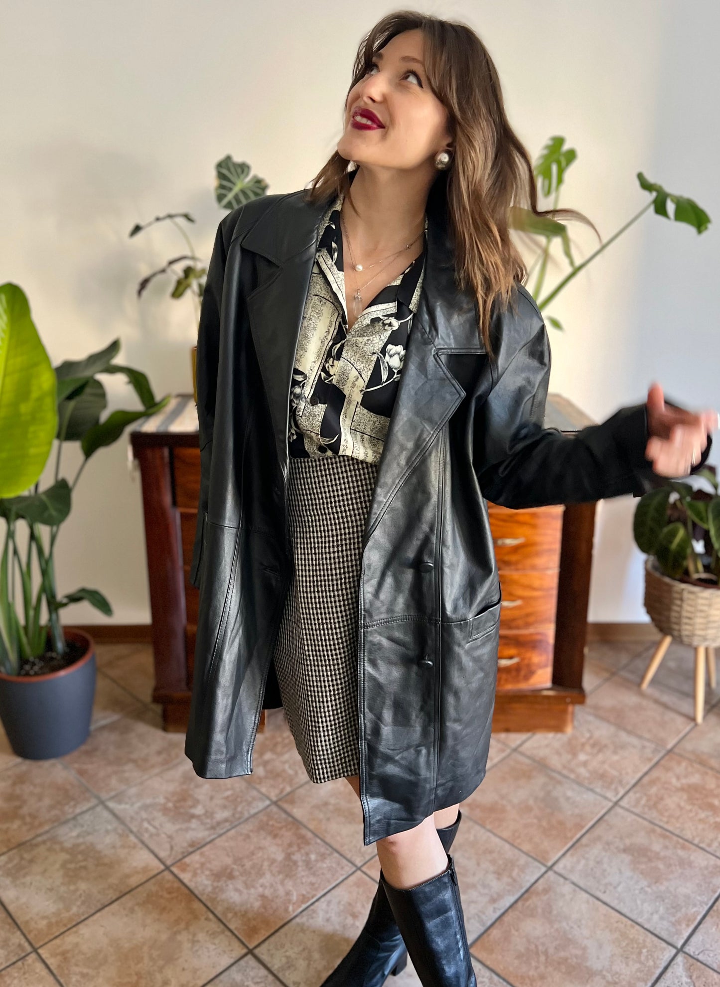 1980's vintage oversize black leather jacket with asymmetrical buttons
