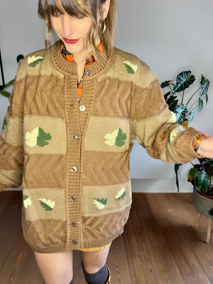 1970's vintage oversize tan trip knit cardigan with green leaf knit pattern
