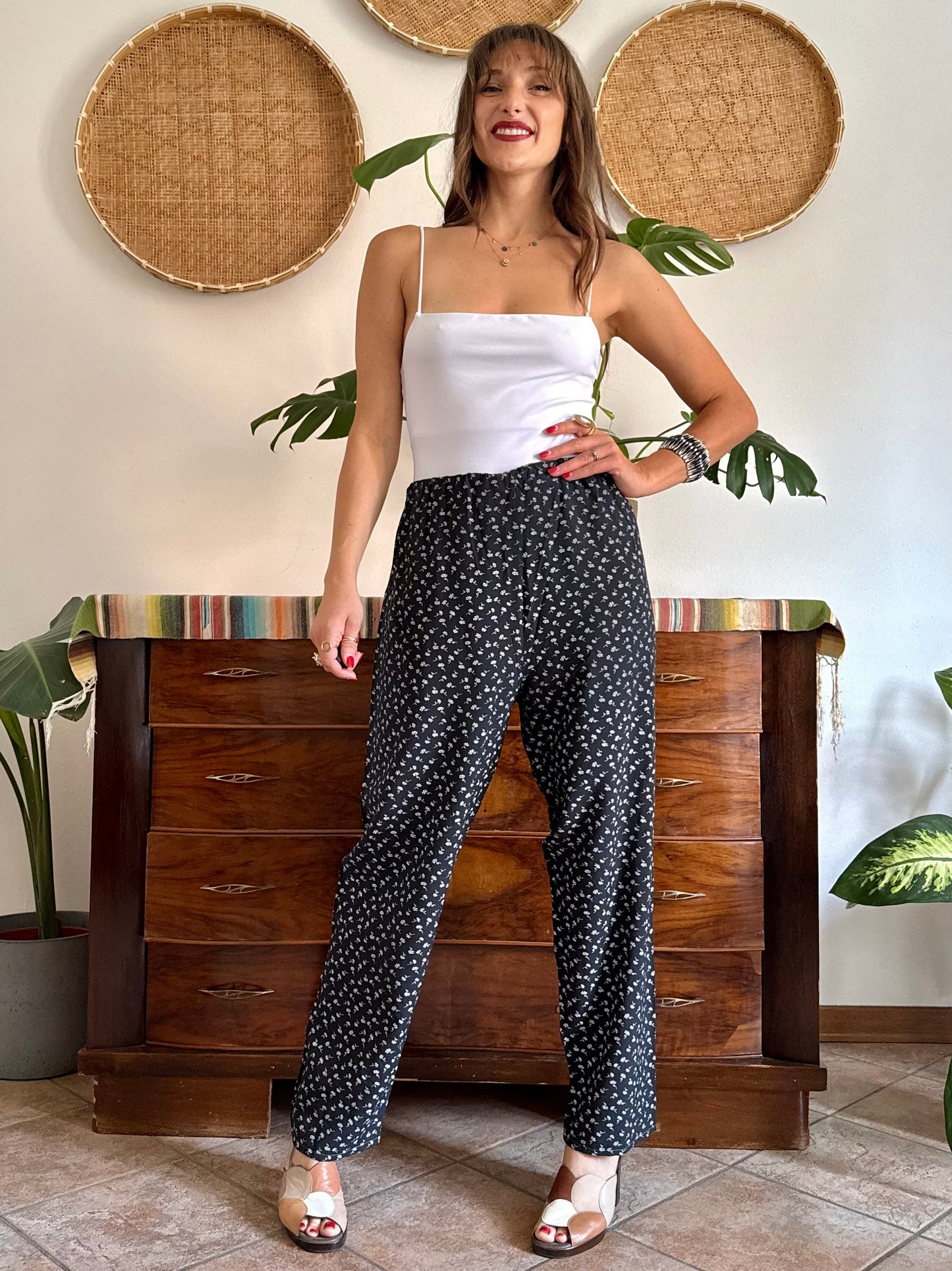1970’s vintage black wide leg trousers with micro white floral embroidery