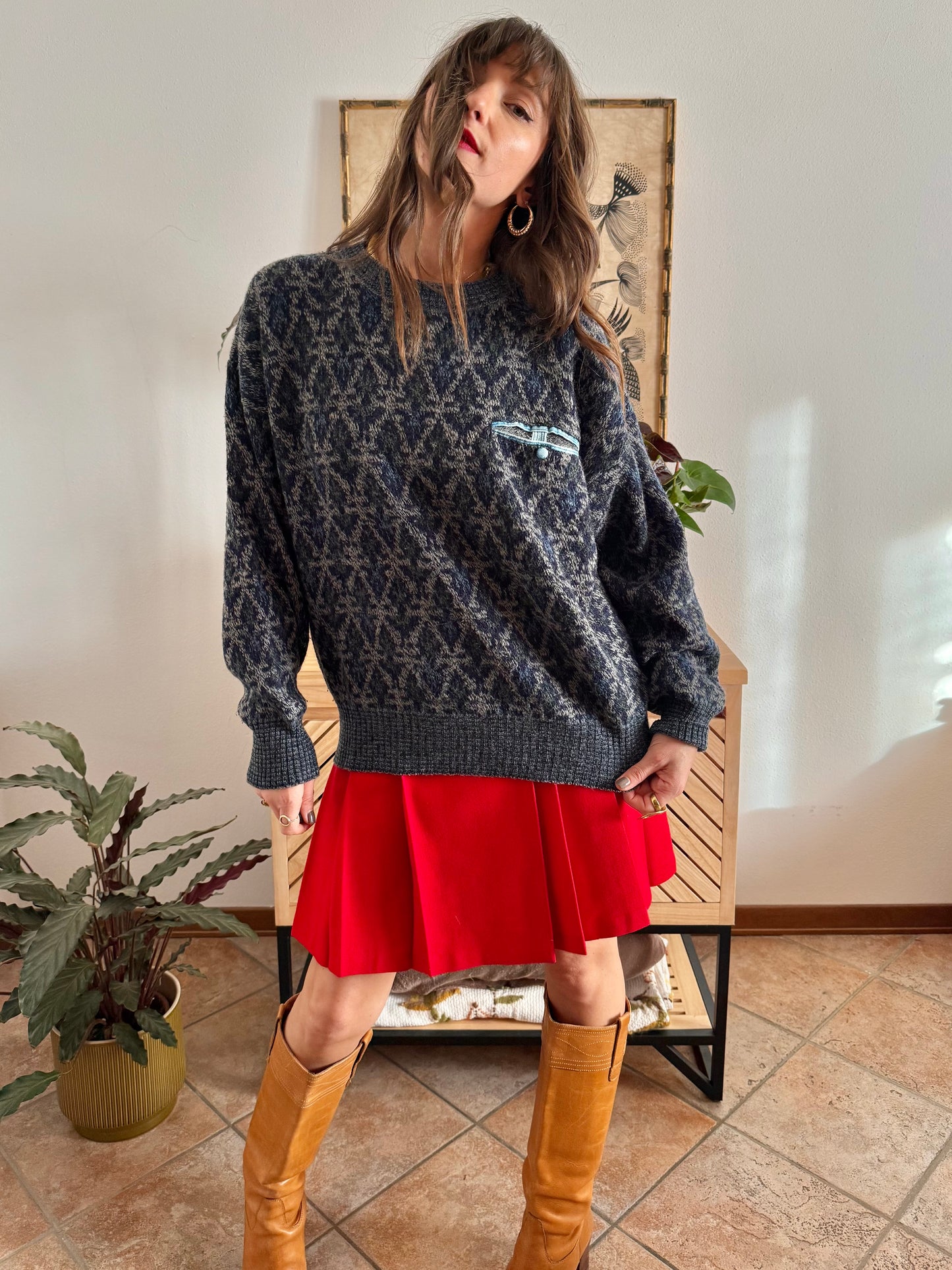 1970's grey wool pullover with blue geometric knit pattern and pocket detail