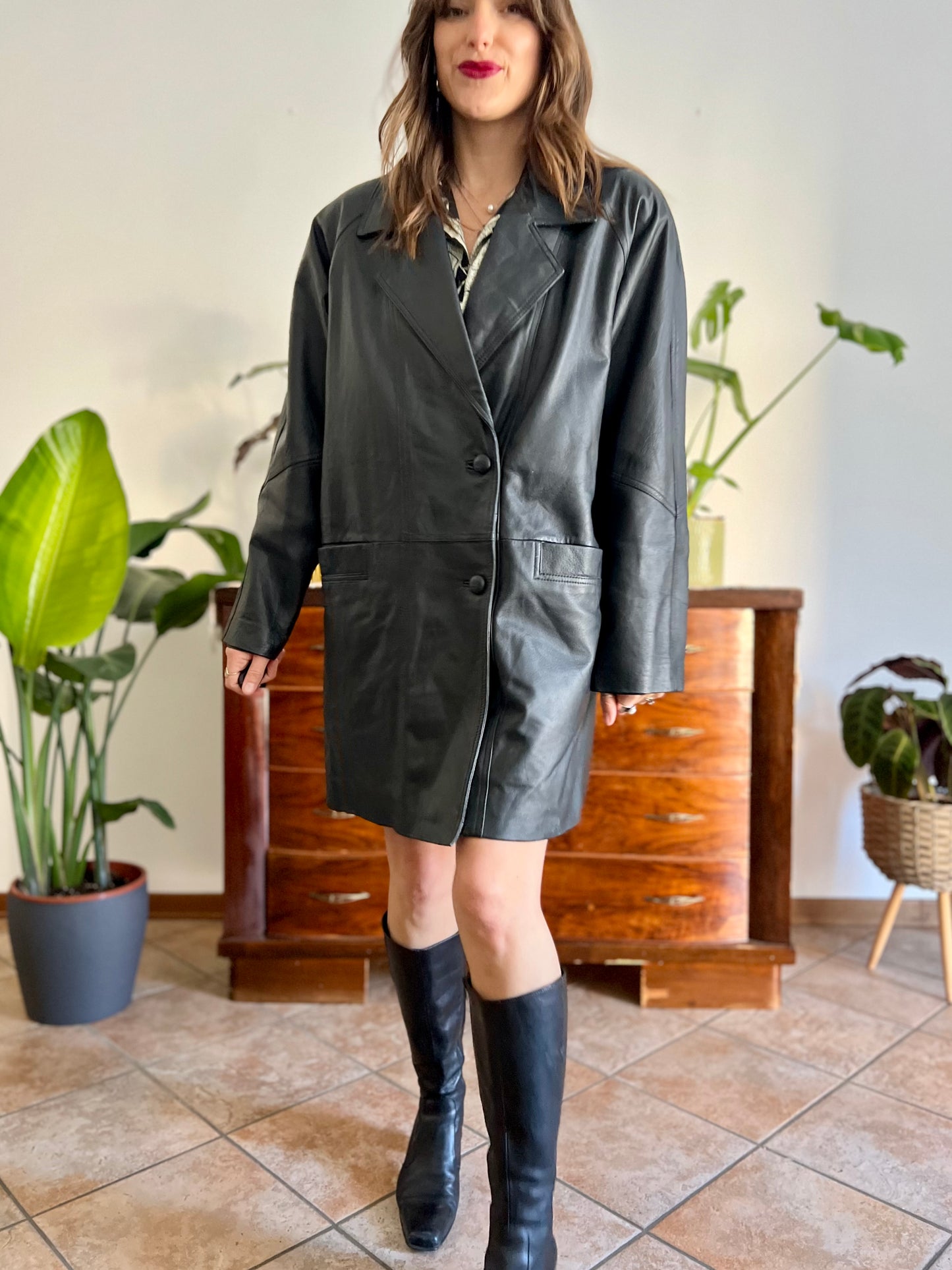 1980's vintage oversize black leather jacket with asymmetrical buttons