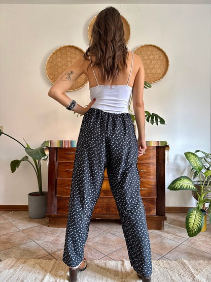1970’s vintage black wide leg trousers with micro white floral embroidery