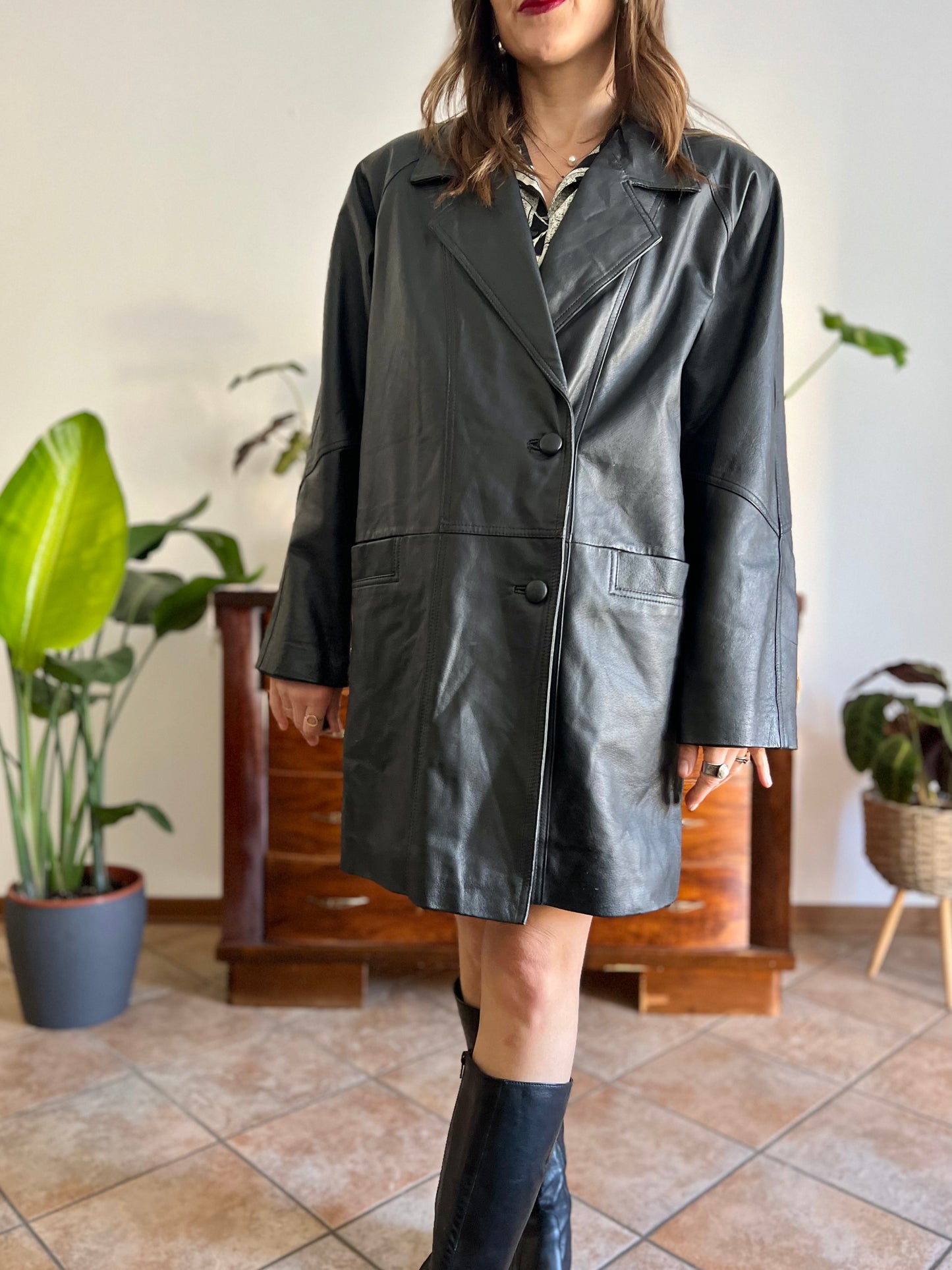 1980's vintage oversize black leather jacket with asymmetrical buttons