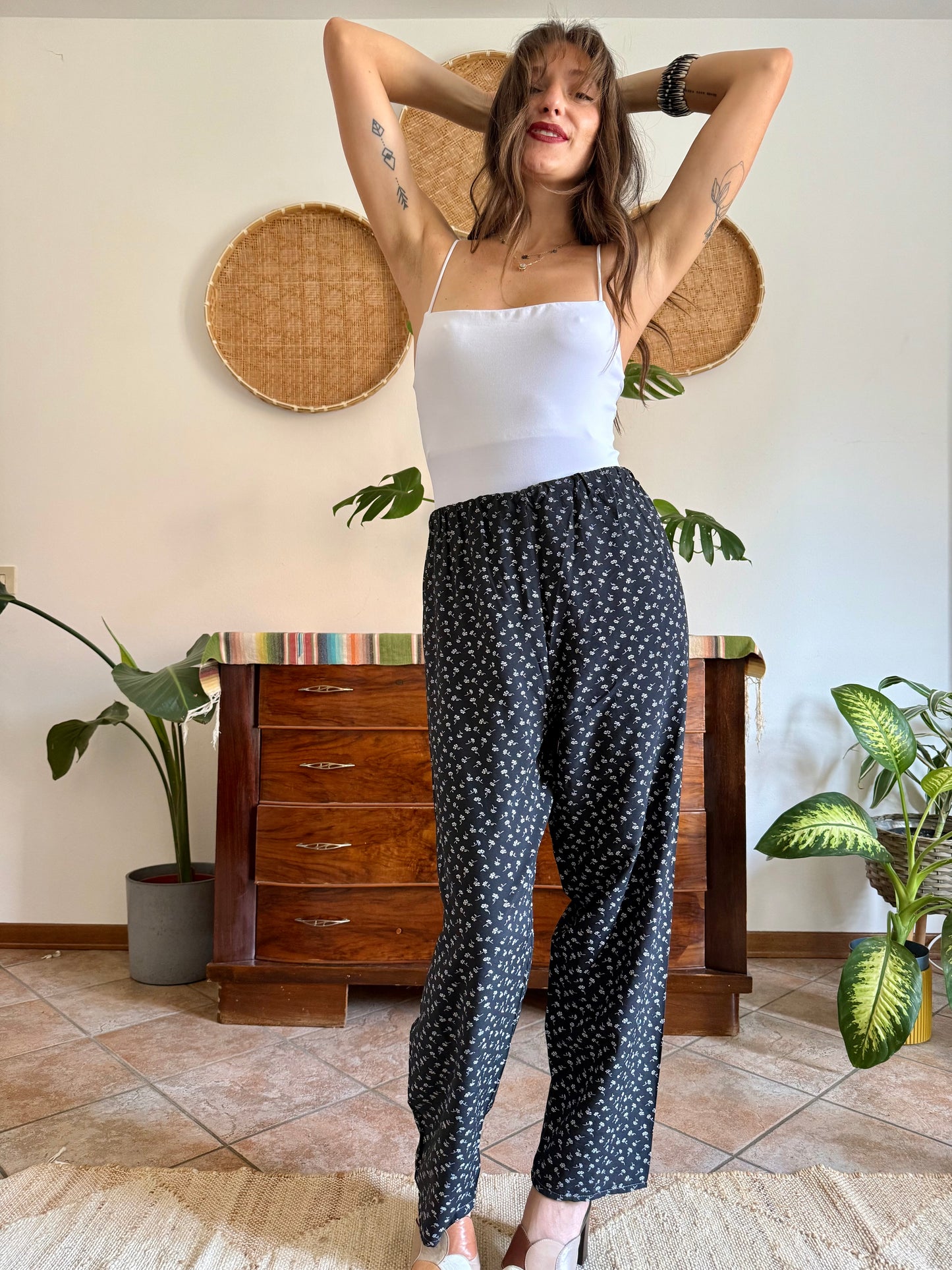 1970’s vintage black wide leg trousers with micro white floral embroidery