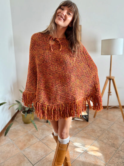 1970's vintage yellow and burgundy knit poncho with fringe details