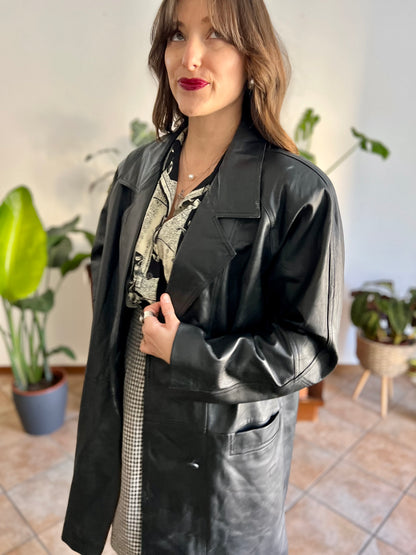 1980's vintage oversize black leather jacket with asymmetrical buttons
