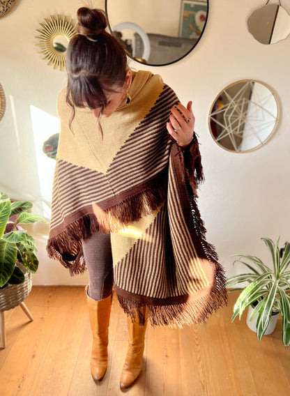 1970's vintage hand knit tan and chocolate brown geometric knit poncho with fringe detail