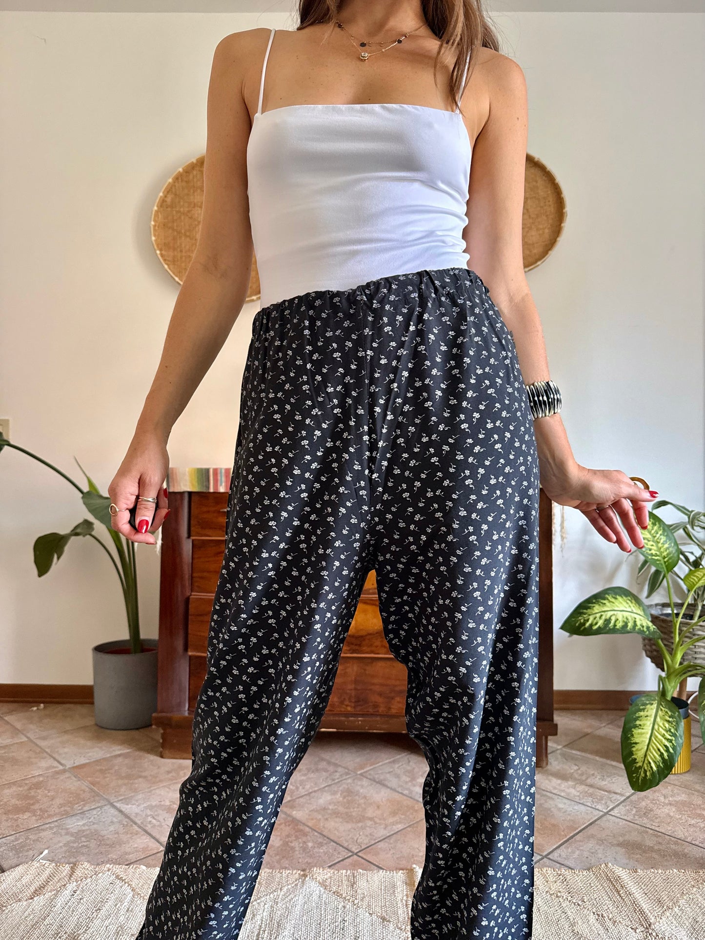 1970’s vintage black wide leg trousers with micro white floral embroidery