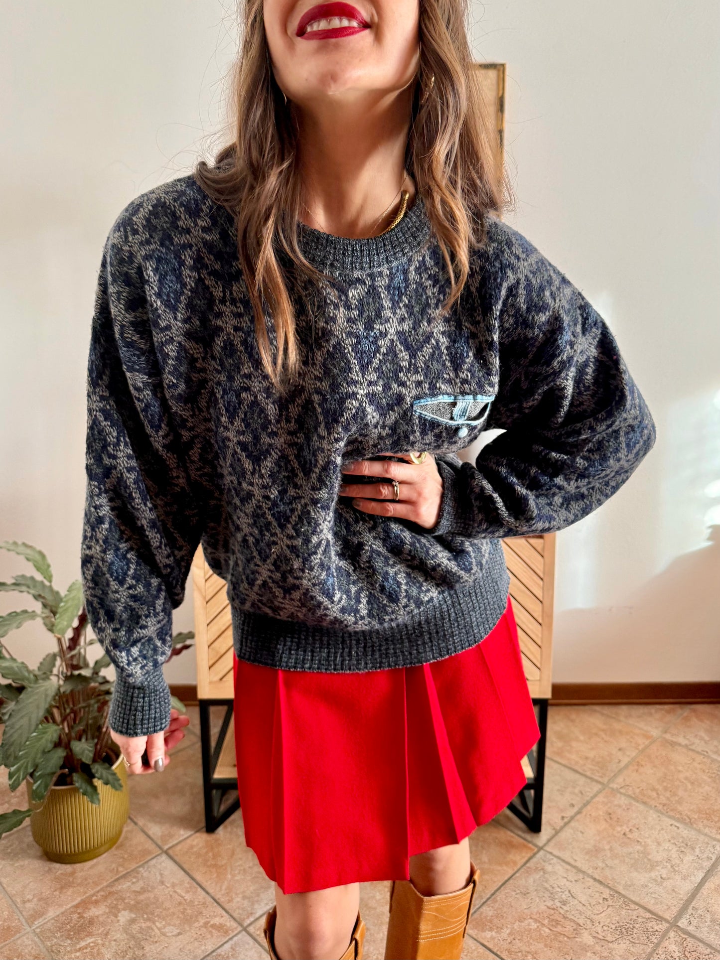 1970's grey wool pullover with blue geometric knit pattern and pocket detail