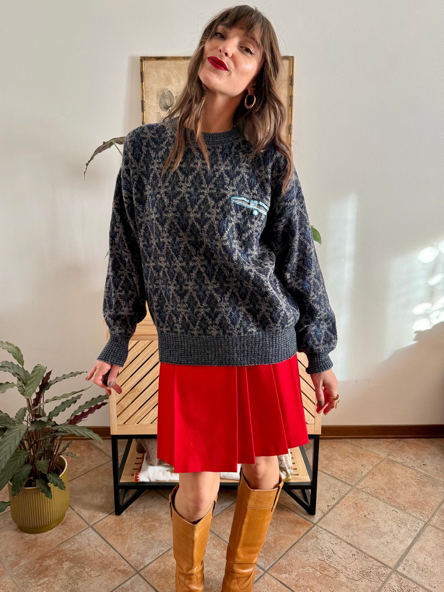 1970's grey wool pullover with blue geometric knit pattern and pocket detail