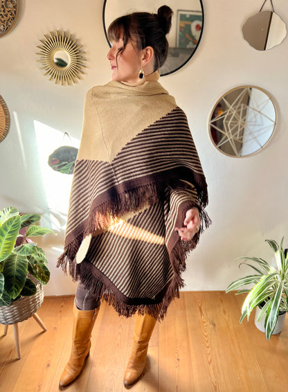 1970's vintage hand knit tan and chocolate brown geometric knit poncho with fringe detail