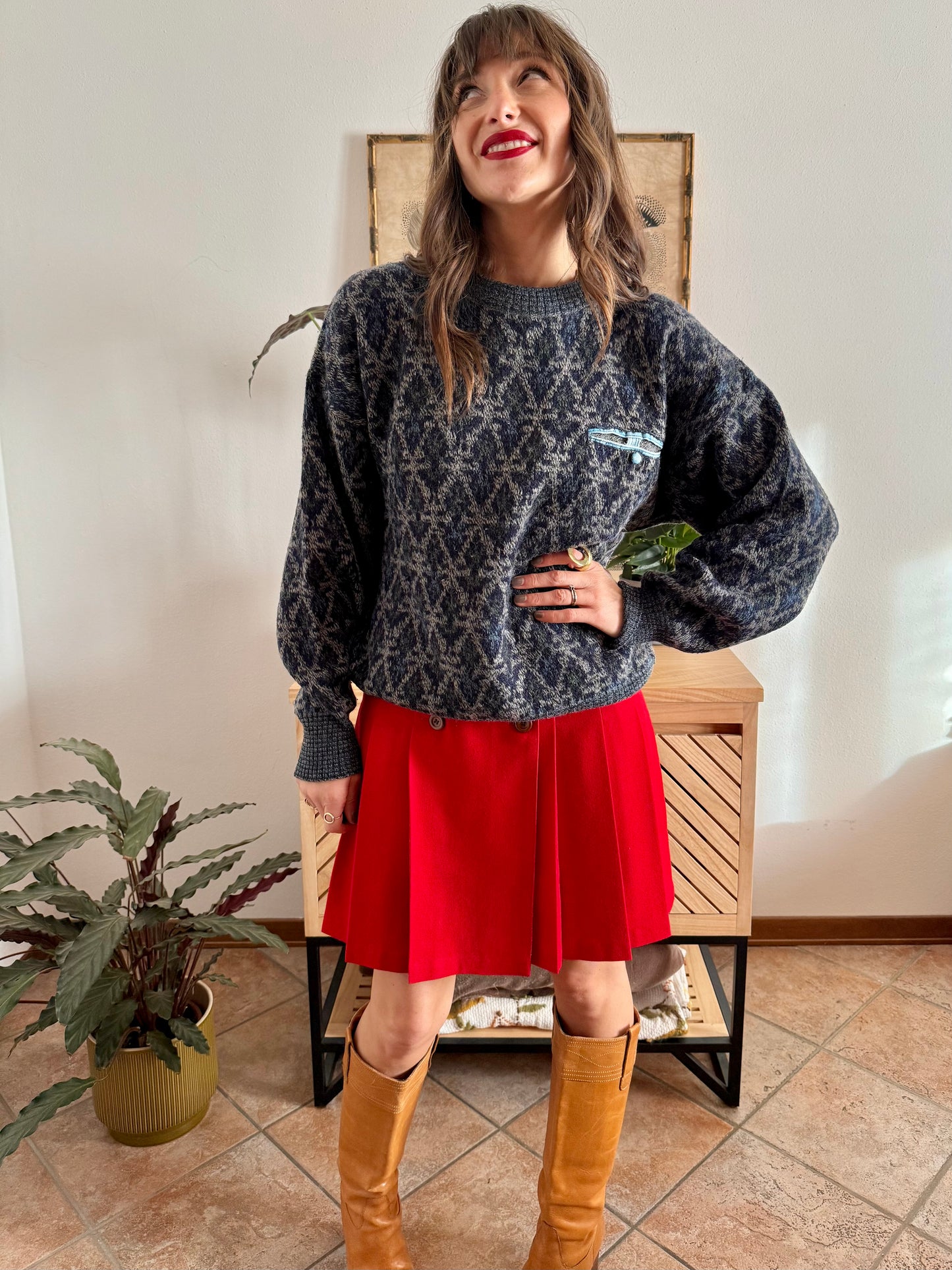 1970's grey wool pullover with blue geometric knit pattern and pocket detail