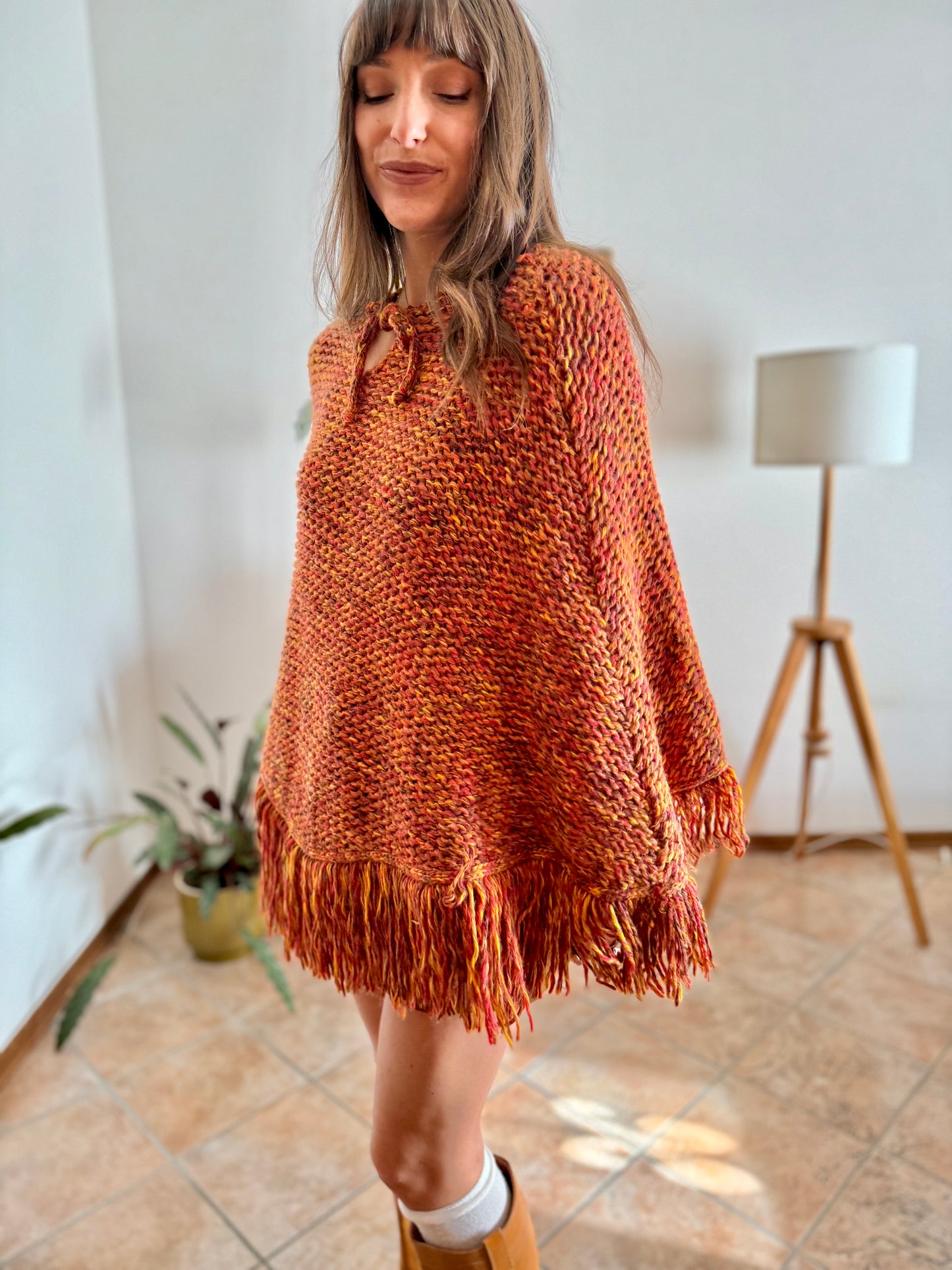 1970's vintage yellow and burgundy knit poncho with fringe details