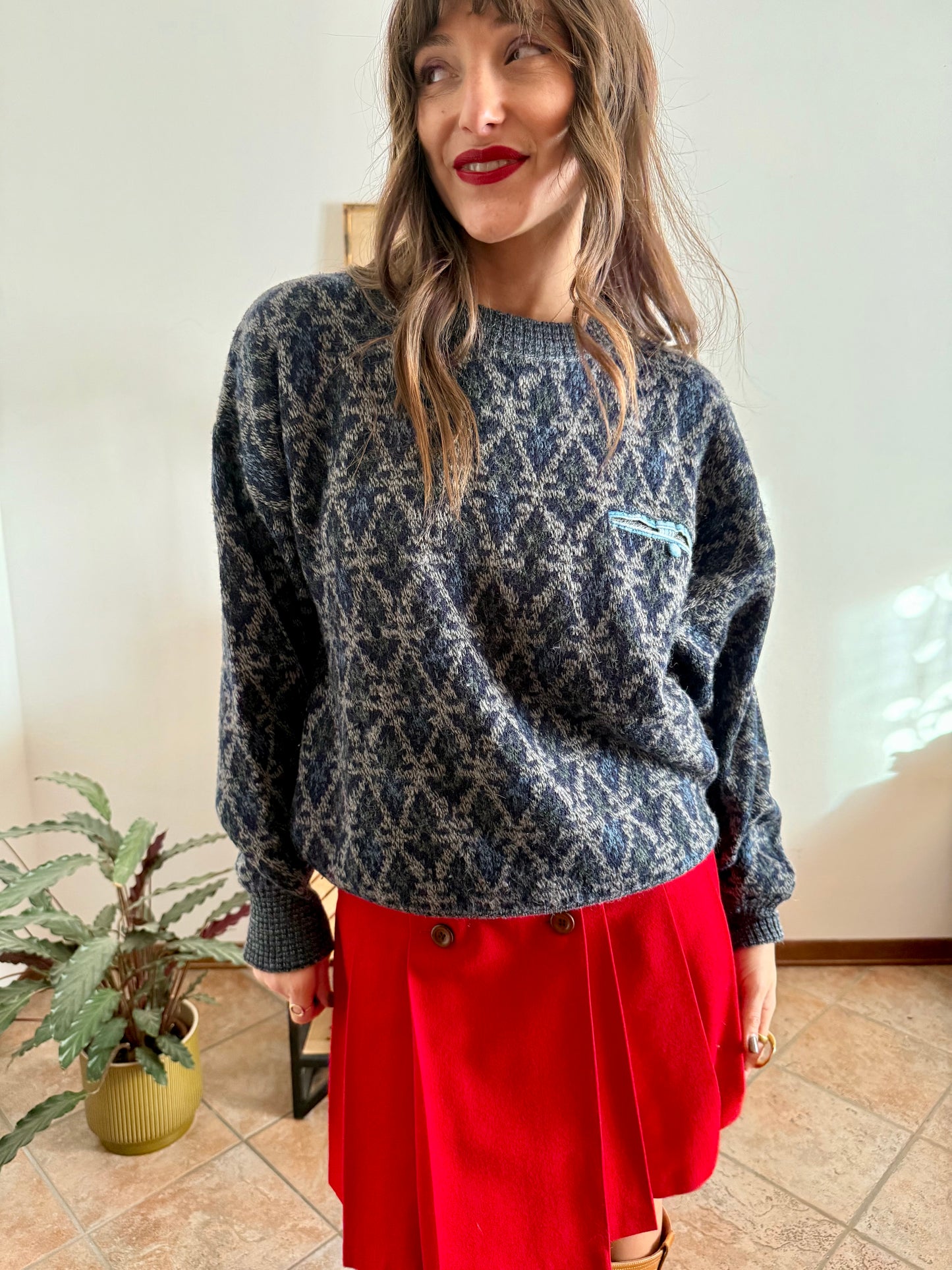 1970's grey wool pullover with blue geometric knit pattern and pocket detail