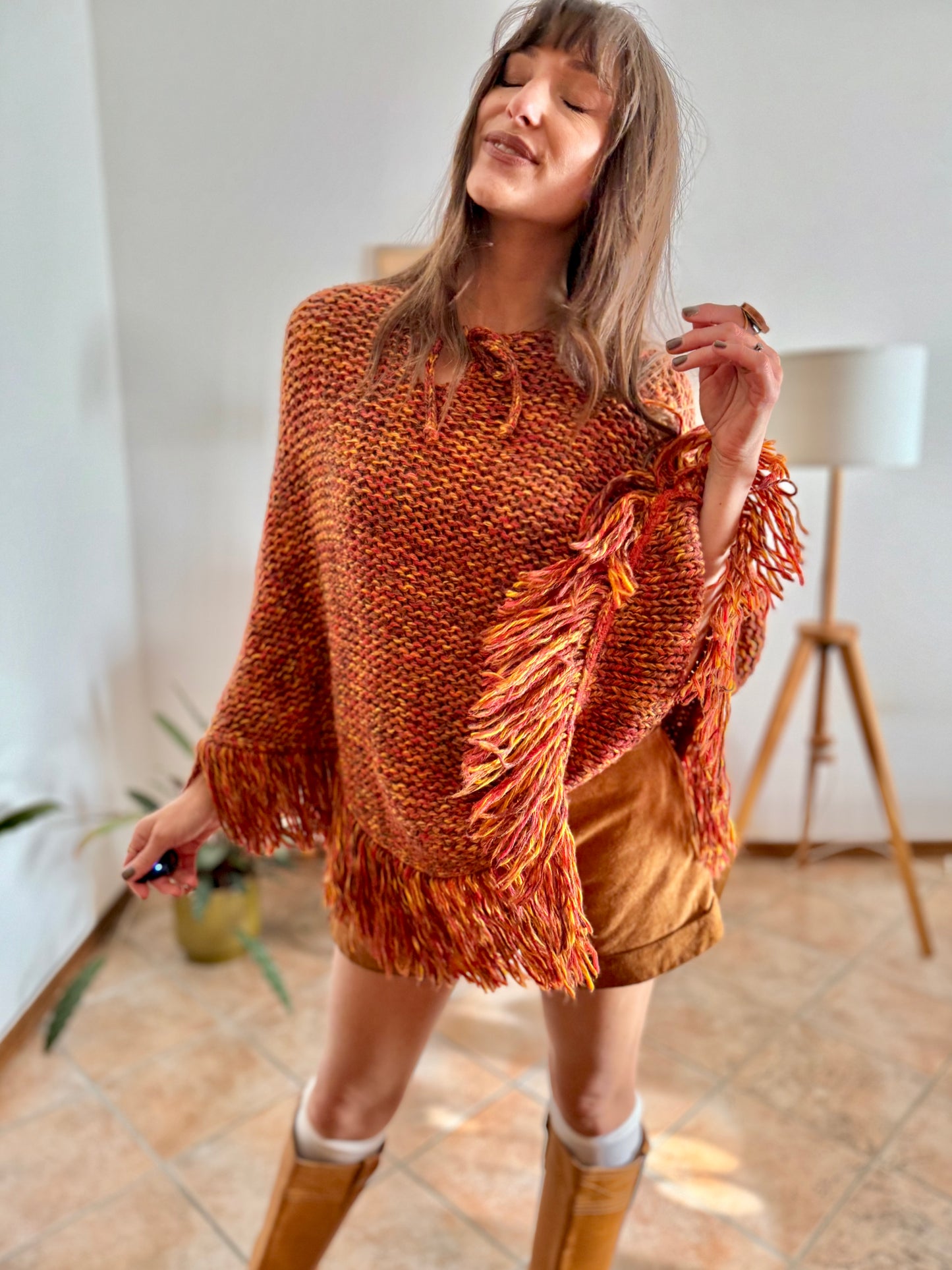 1970's vintage yellow and burgundy knit poncho with fringe details