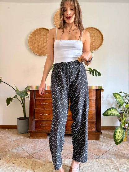1970’s vintage black wide leg trousers with micro white floral embroidery
