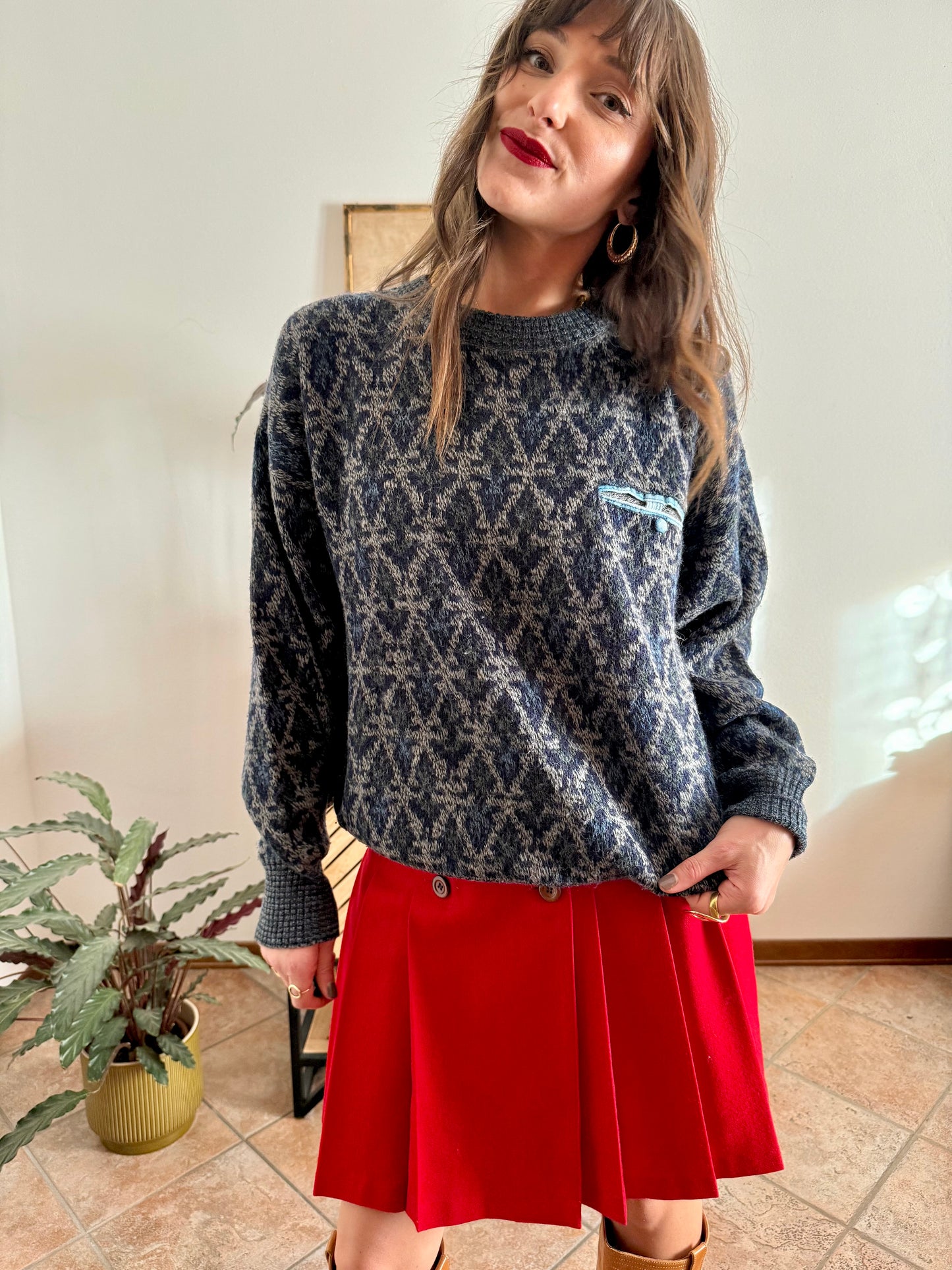 1970's grey wool pullover with blue geometric knit pattern and pocket detail