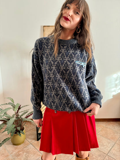 1970's grey wool pullover with blue geometric knit pattern and pocket detail